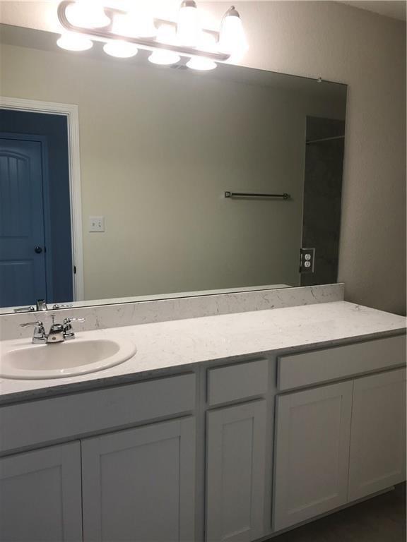 115 Iron Rail Road Dripping Springs, TX 78620 - Photo 13 of 16 Bathroom with vanity