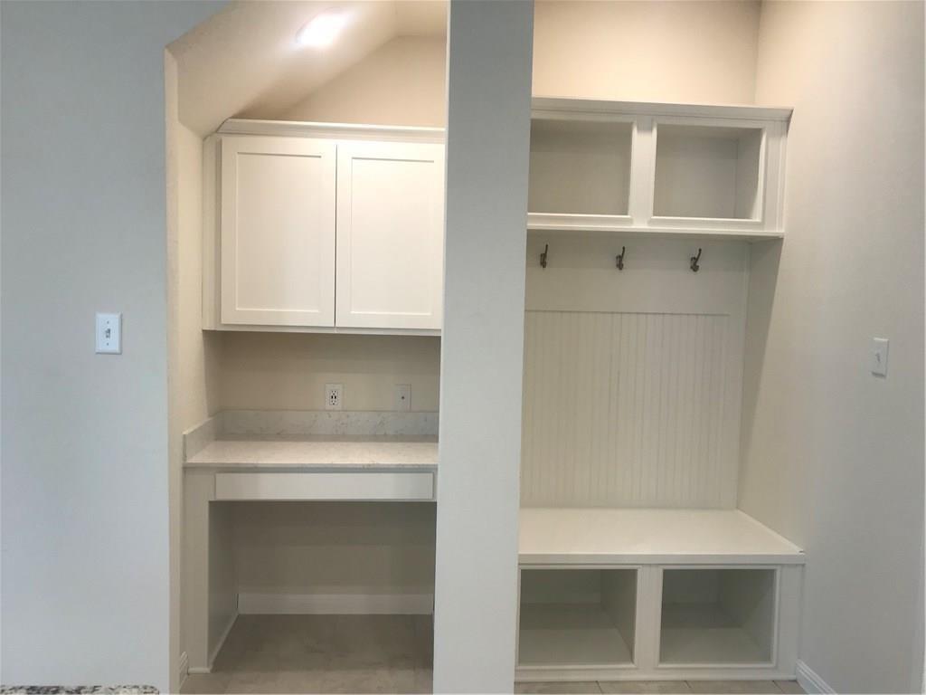 115 Iron Rail Road Dripping Springs, TX 78620 - Photo 5 of 16 Mudroom featuring baseboards and light tile patterned floors