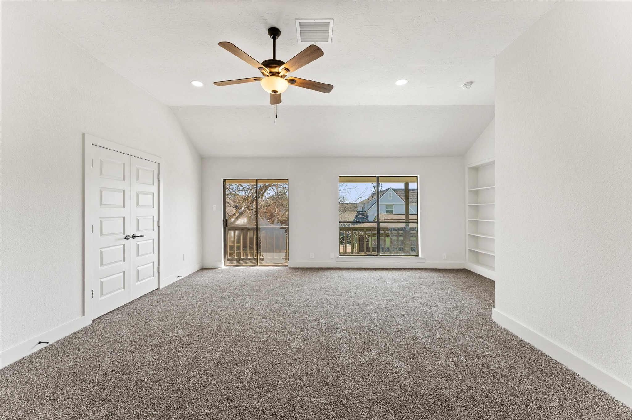 3725 Griggs Road Houston, TX 77021 - Photo 27 of 37 Your upstairs family room is over 400 square feet with high ceilings, recessed lighting and access to the back balcony.