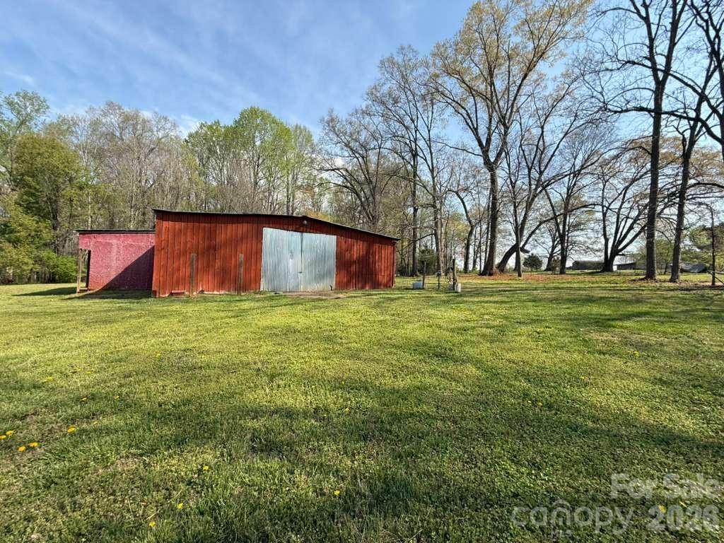 1882 George Brown Road Crouse, NC 28033 - Photo 40 of 48 a view of a backyard with large trees