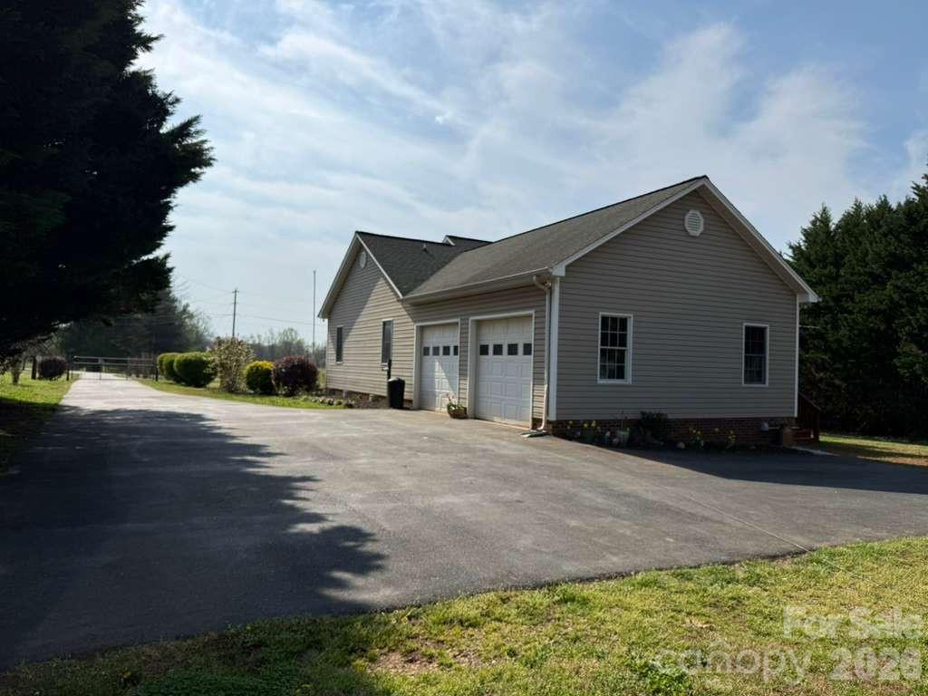 1882 George Brown Road Crouse, NC 28033 - Photo 42 of 48 a front view of a house with a yard