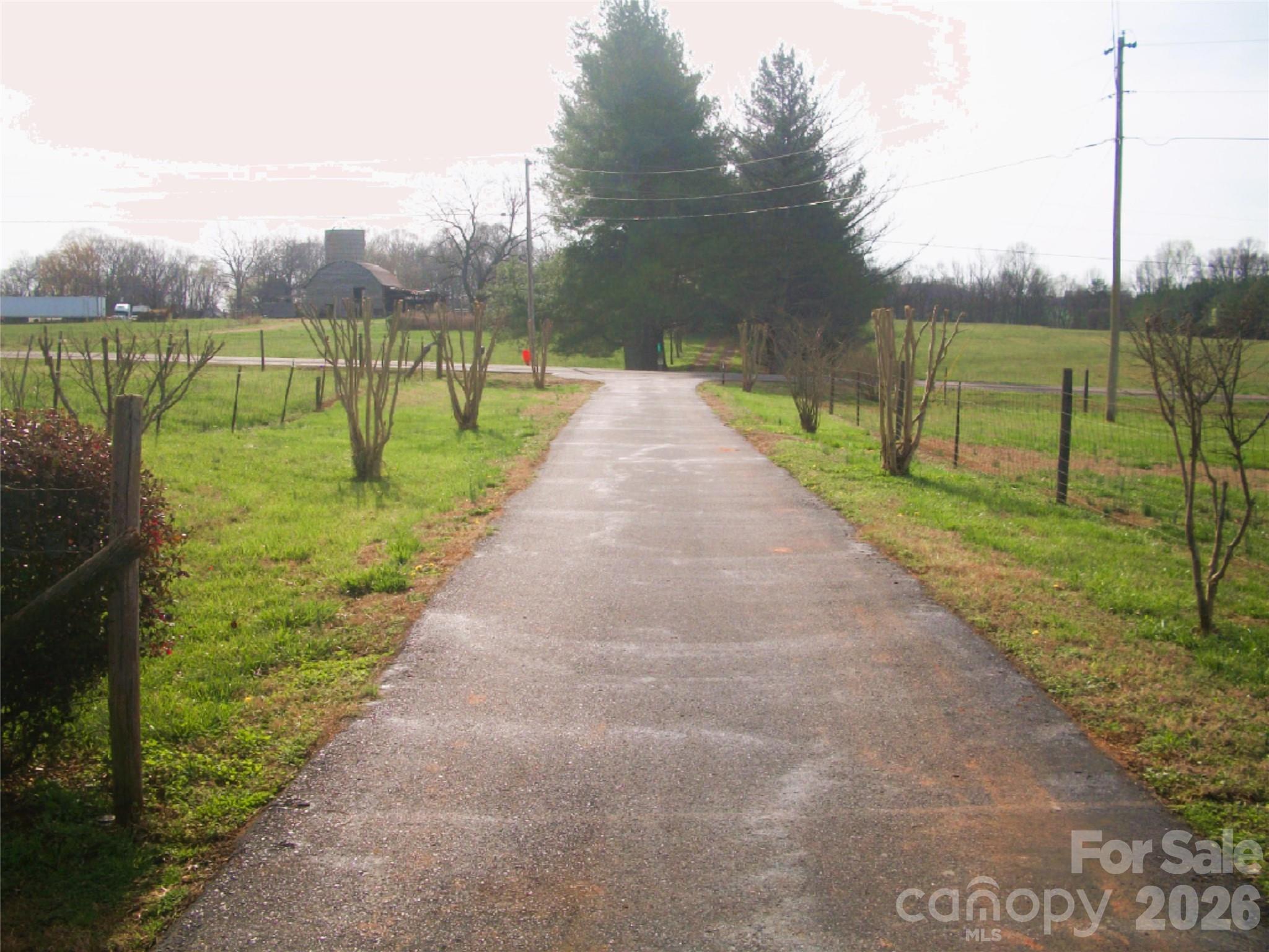 1882 George Brown Road Crouse, NC 28033 - Photo 43 of 48 a view of a lake with a big yard