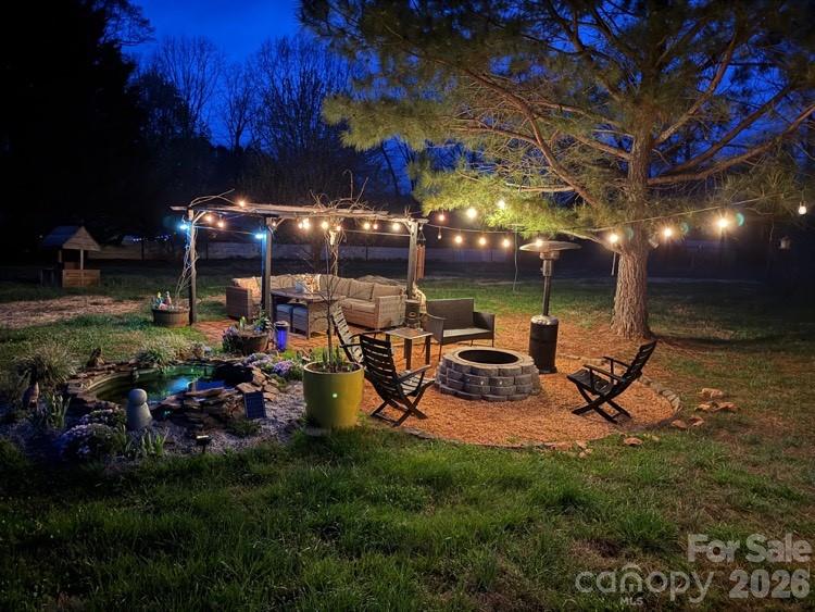 1882 George Brown Road Crouse, NC 28033 - Photo 47 of 48 a view of a room with lots of plants and entertaining space