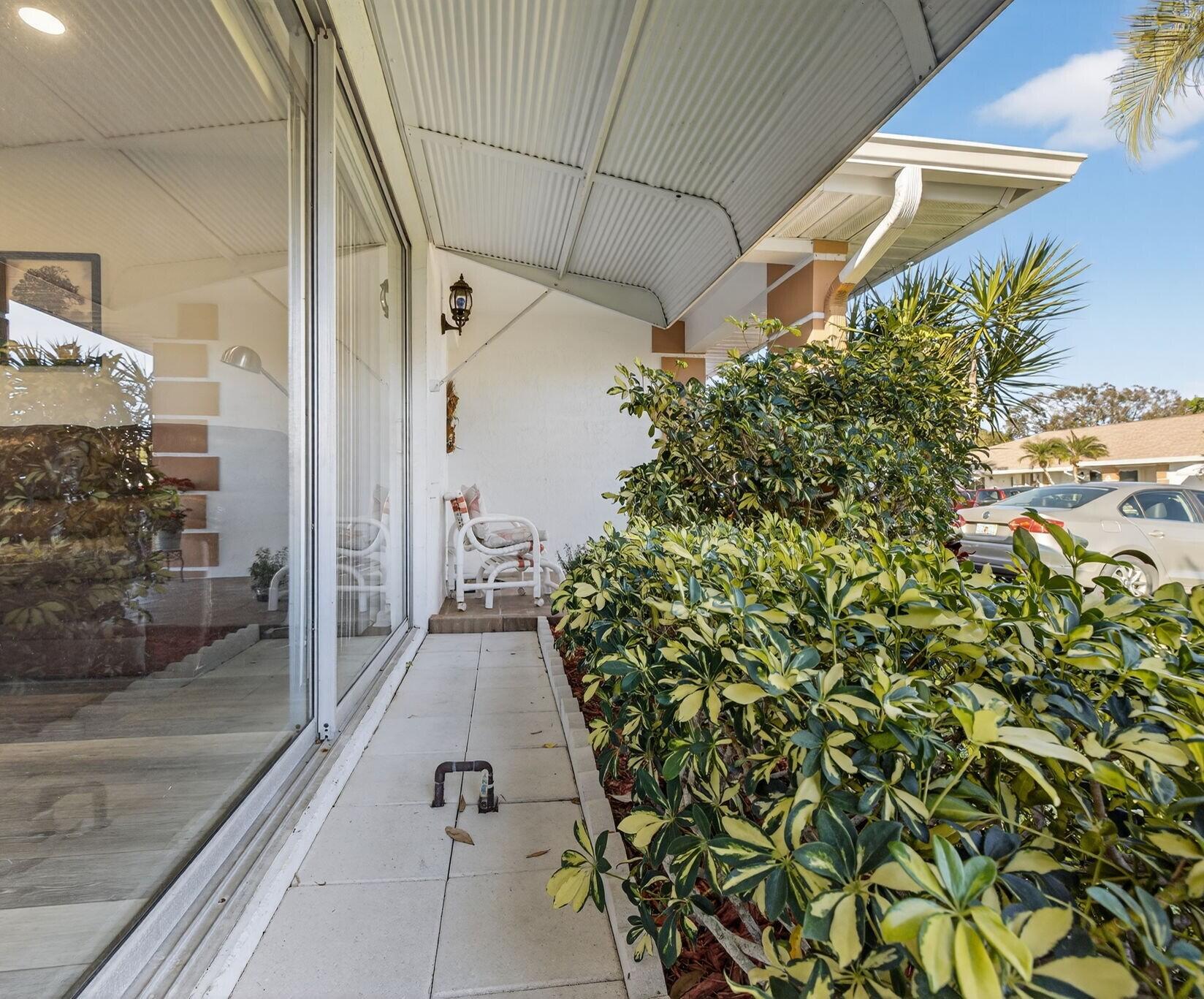 319 Colony Lane, Unit C Fort Pierce, FL 34982 - Photo 3 of 28 FrontSlidingDoor