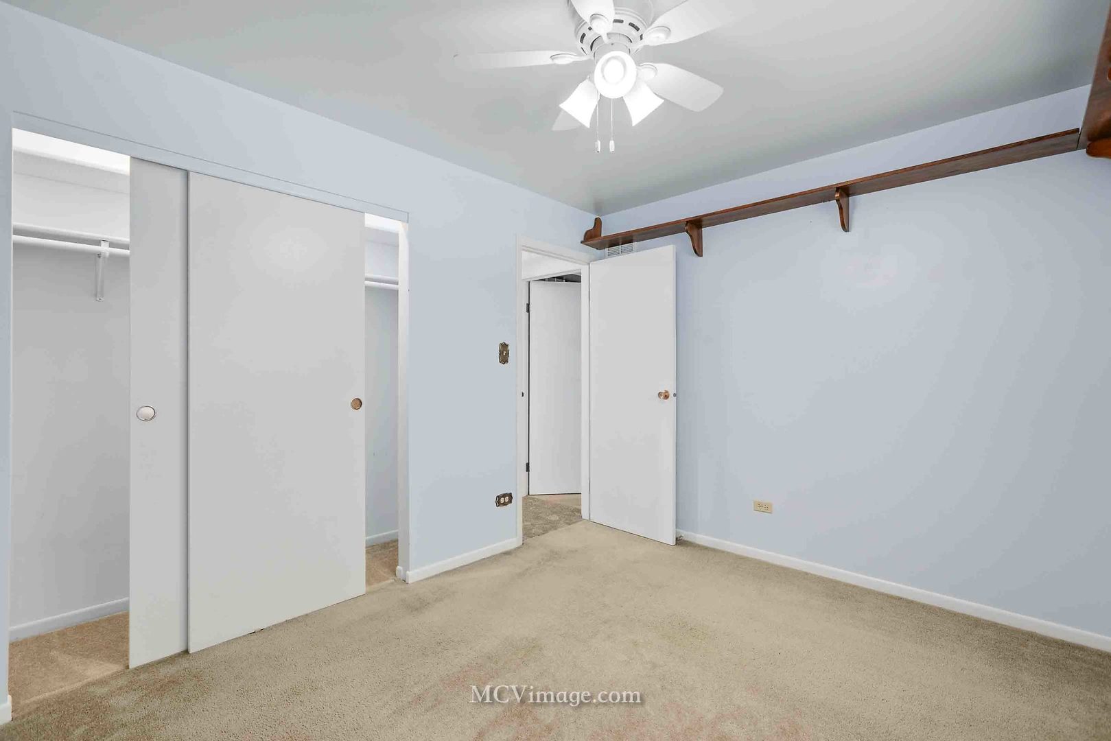 563 Quail Run Road Matteson, IL 60443 - Photo 13 of 25 a view of a chandelier fan in a room