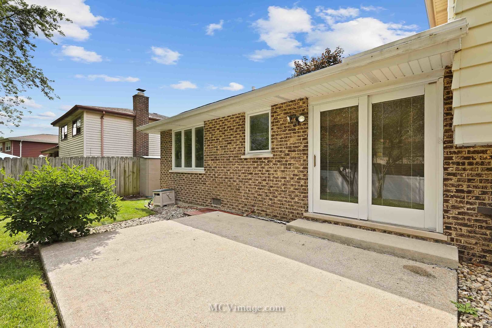 563 Quail Run Road Matteson, IL 60443 - Photo 21 of 25 a front view of a house with a yard and garage