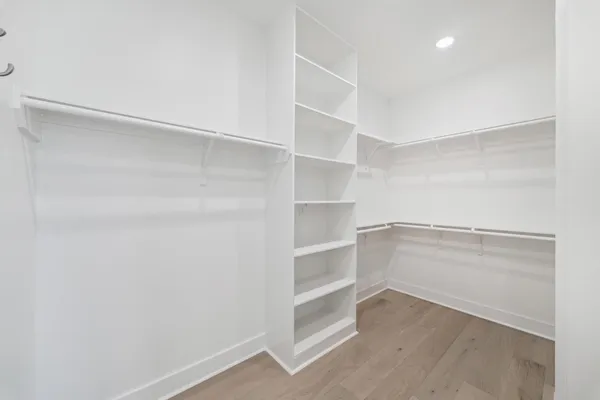 a view of an empty walk in closet