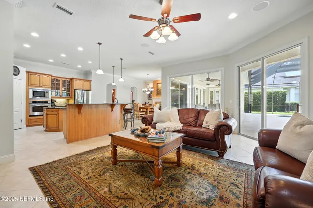 a utility room with sink dryer and washer