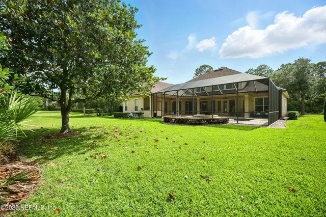 a view of swimming pool with seating space and deck