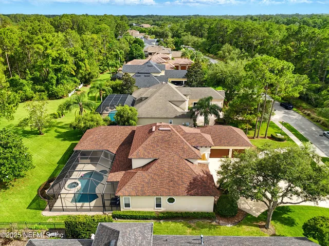 an aerial view of a city with lots of residential buildings