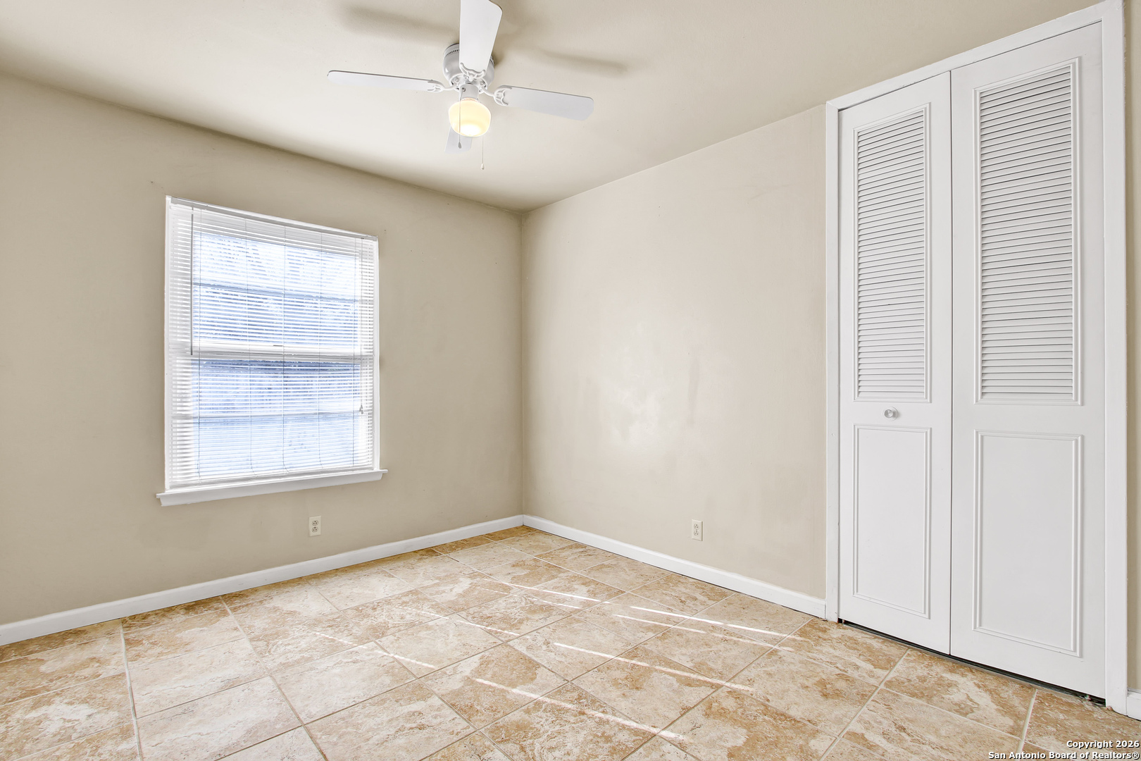 6711 Spring Hollow Street San Antonio, TX 78249 - Photo 14 of 23 a view of an empty room with a window