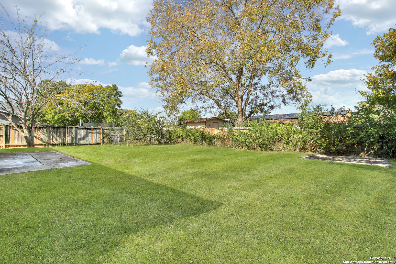 6711 Spring Hollow Street San Antonio, TX 78249 - Photo 20 of 23 a view of field with trees in the background