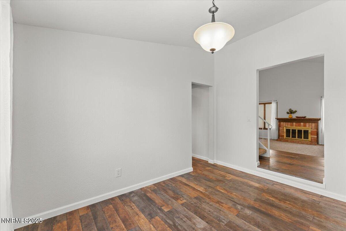 2060 Kings Row Reno, NV 89503 - Photo 13 of 37 a view of empty room with wooden floor