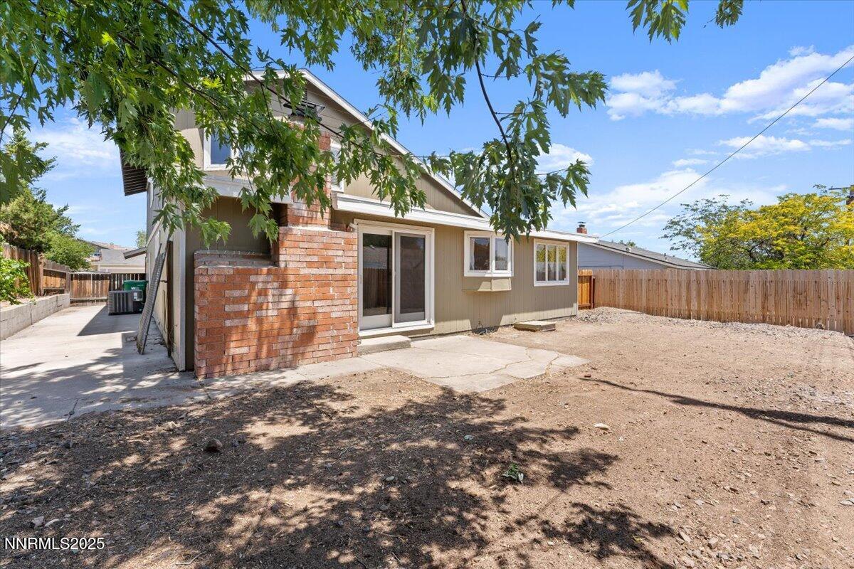 2060 Kings Row Reno, NV 89503 - Photo 29 of 37 a backyard of a house with table and chairs