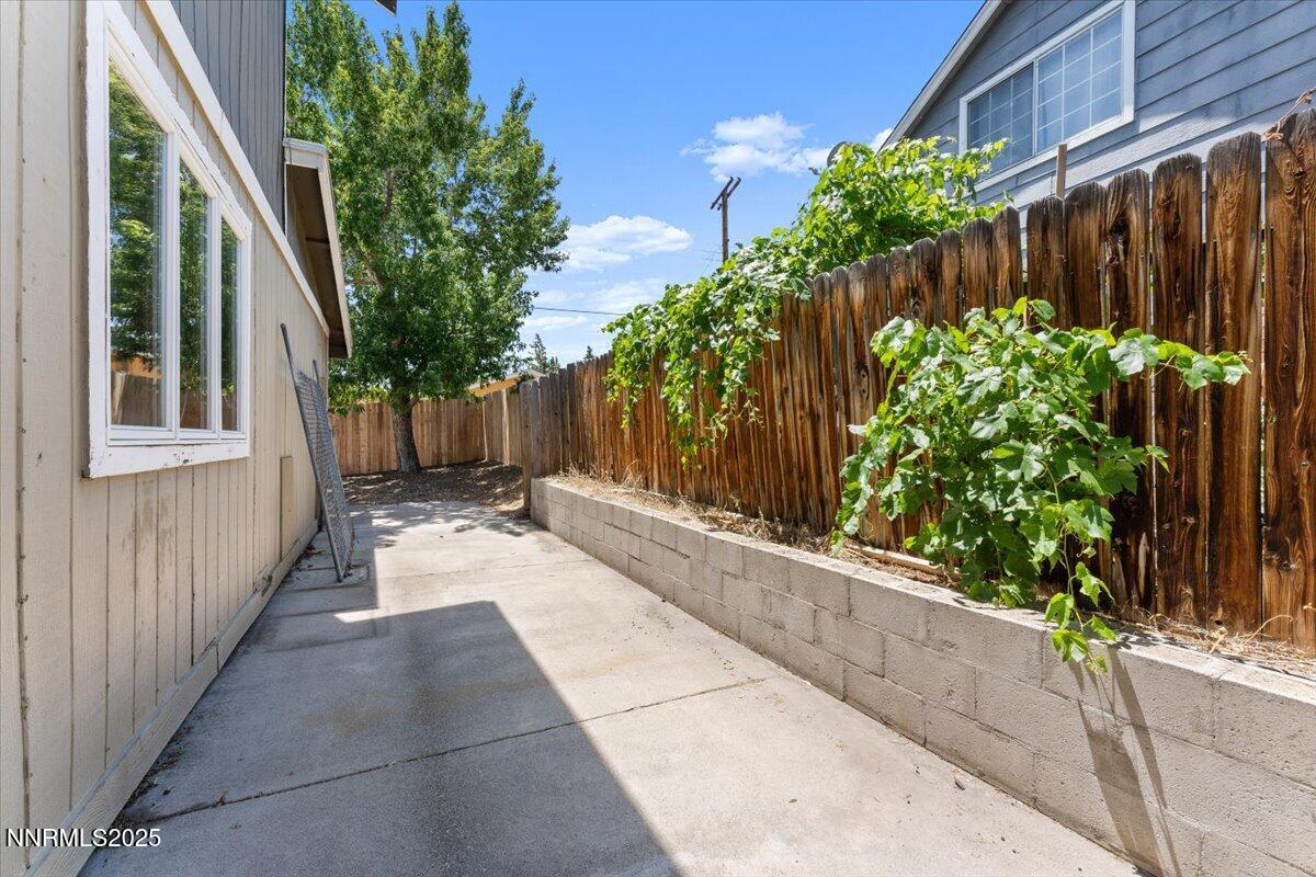 2060 Kings Row Reno, NV 89503 - Photo 32 of 37 a view of a backyard with pathway
