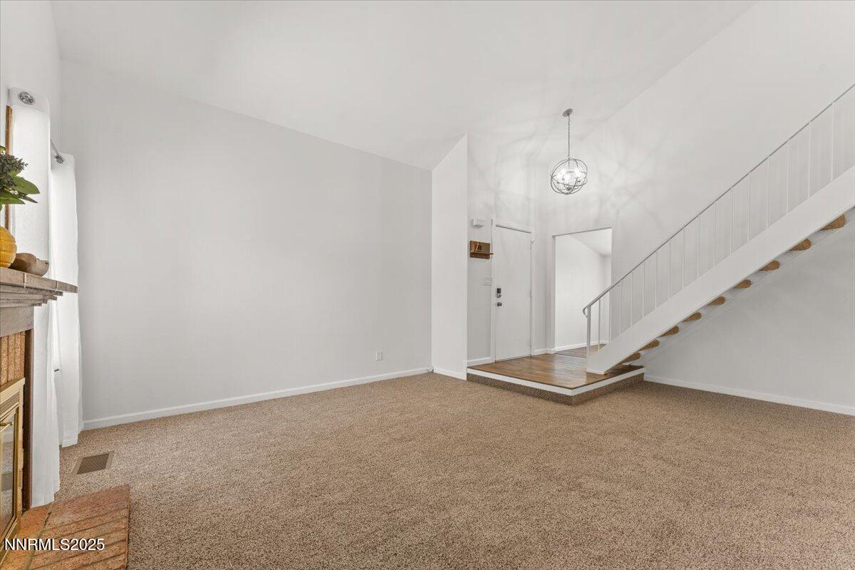2060 Kings Row Reno, NV 89503 - Photo 5 of 37 a view of an empty room with a fireplace