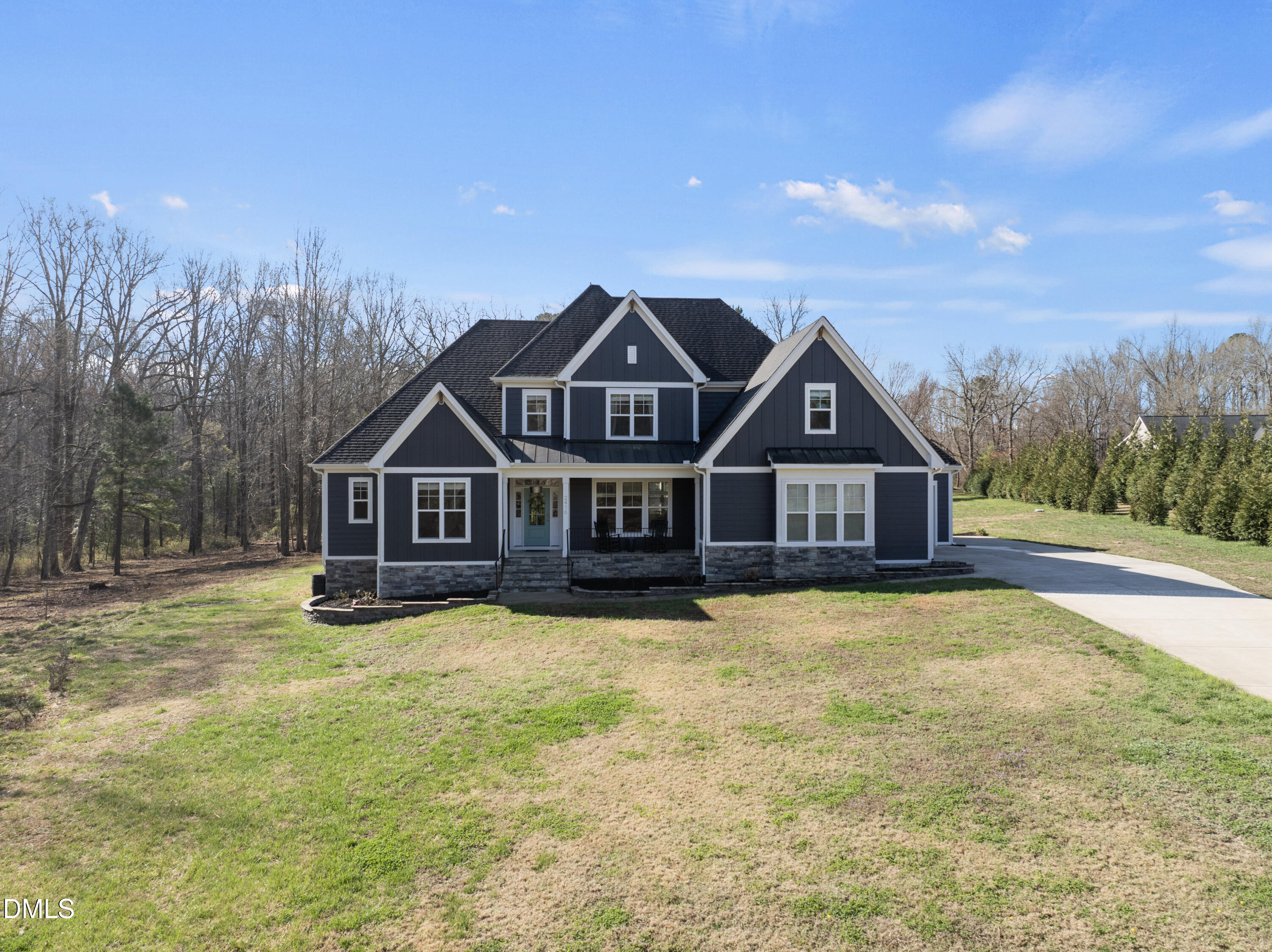 2416 Eddie Howard Road Willow Spring, NC 27592 - Photo 1 of 54 DJI_20260309103937_0012_D
