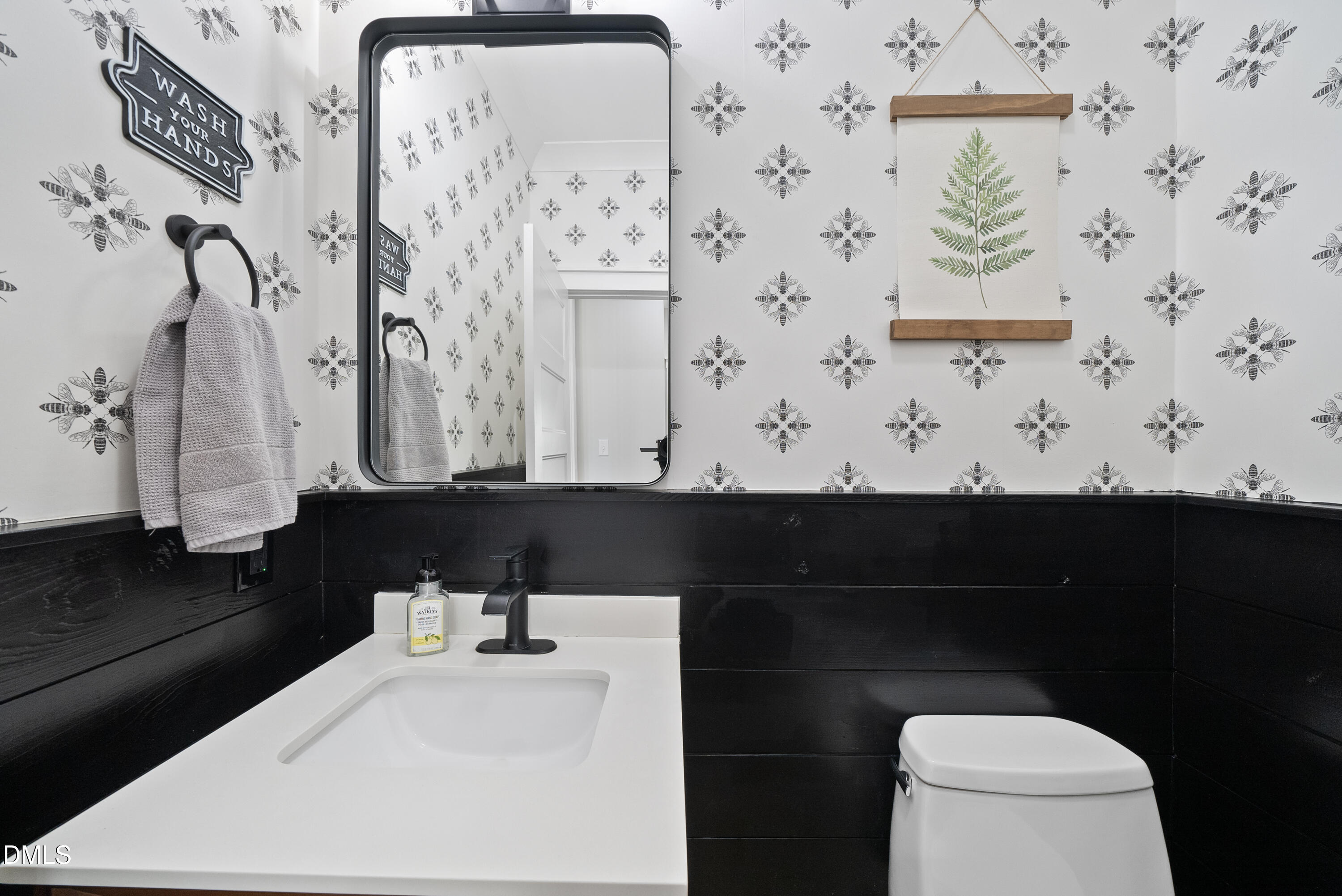 2416 Eddie Howard Road Willow Spring, NC 27592 - Photo 31 of 64 a bathroom with a sink and toilet