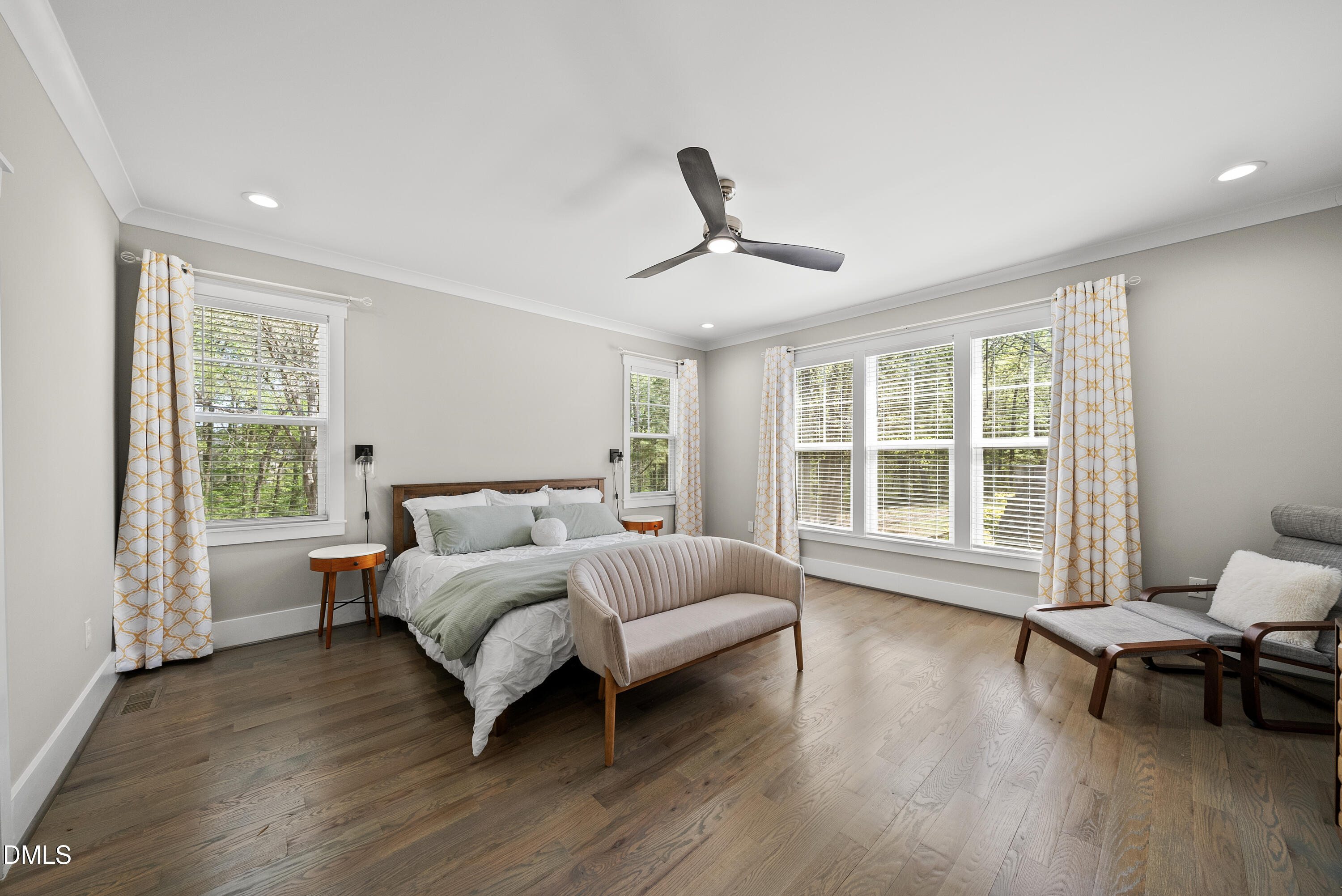 2416 Eddie Howard Road Willow Spring, NC 27592 - Photo 32 of 64 a bed room with a bed and a chair