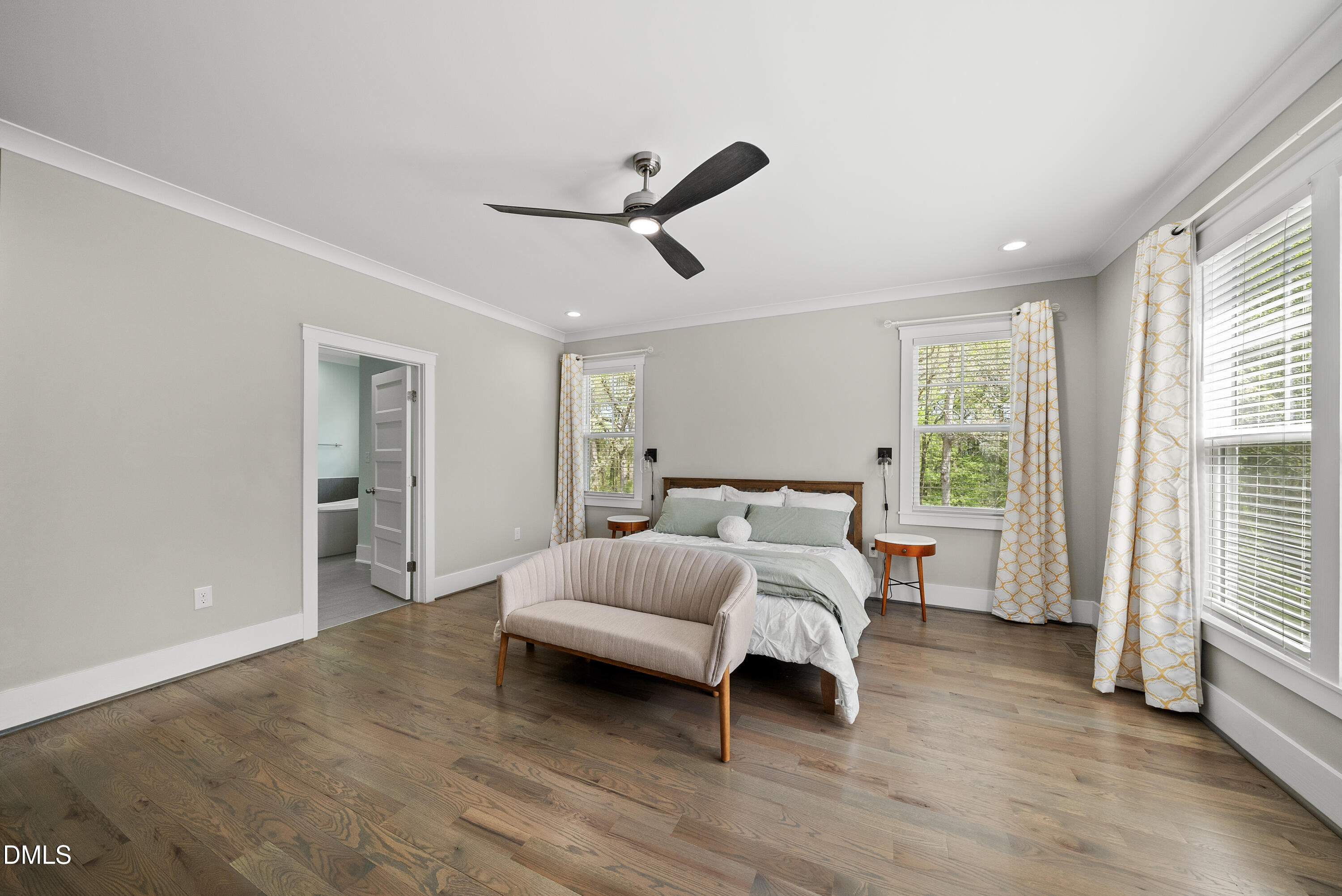 2416 Eddie Howard Road Willow Spring, NC 27592 - Photo 34 of 64 a bed room with a bed and a window