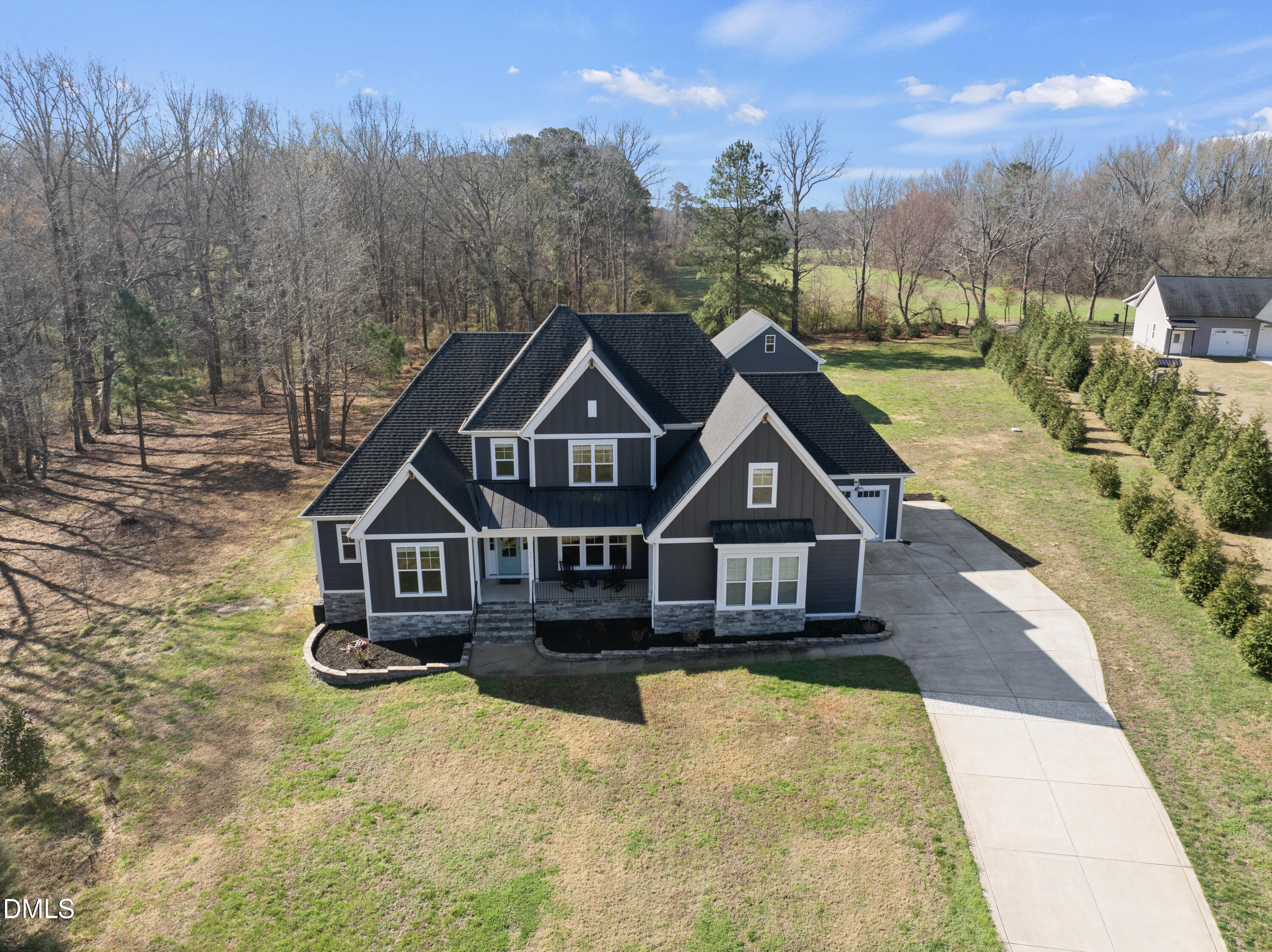 2416 Eddie Howard Road Willow Spring, NC 27592 - Photo 3 of 54 DJI_20260309103944_0015_D