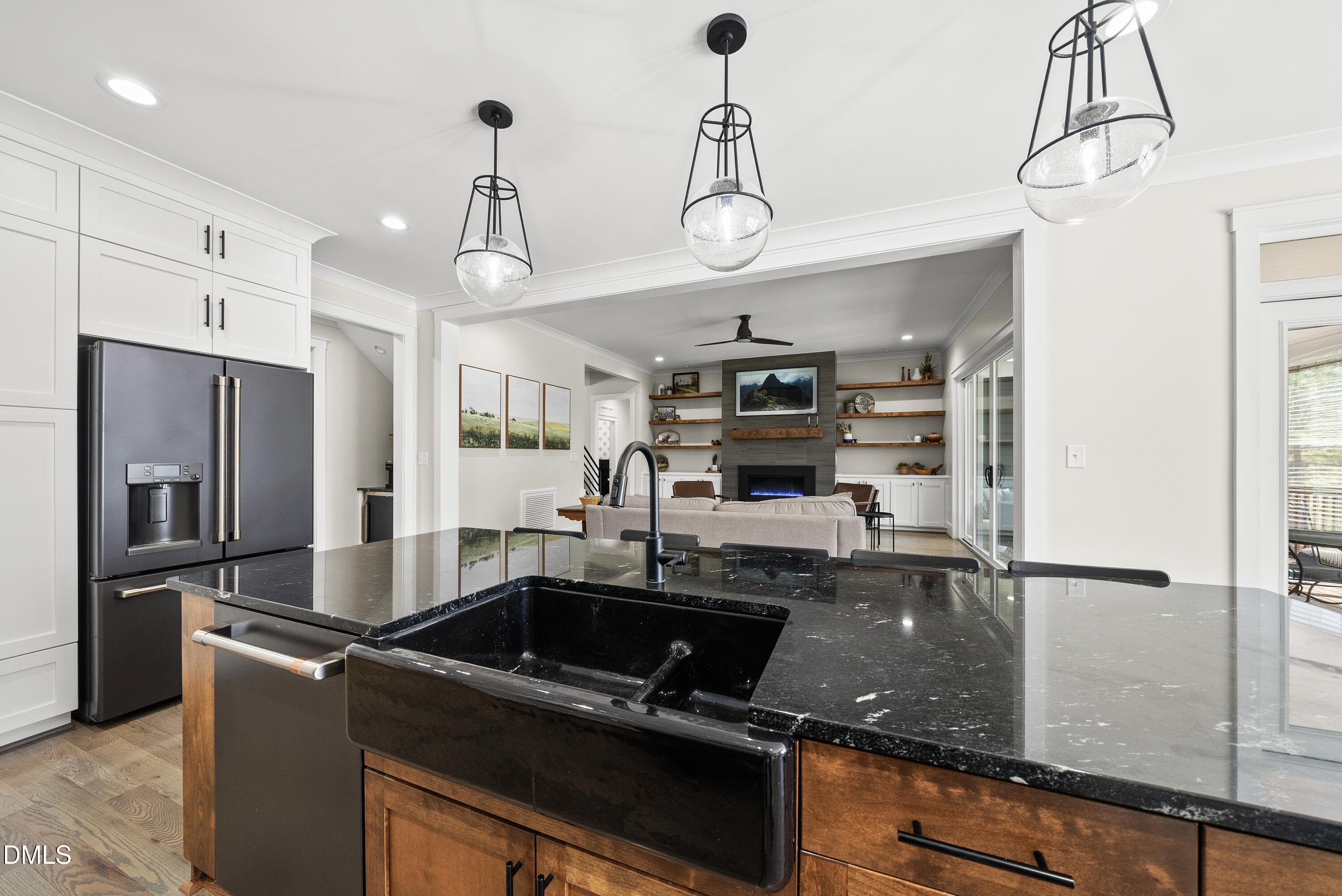 2416 Eddie Howard Road Willow Spring, NC 27592 - Photo 45 of 64 a kitchen with granite countertop a sink appliances and a counter top space