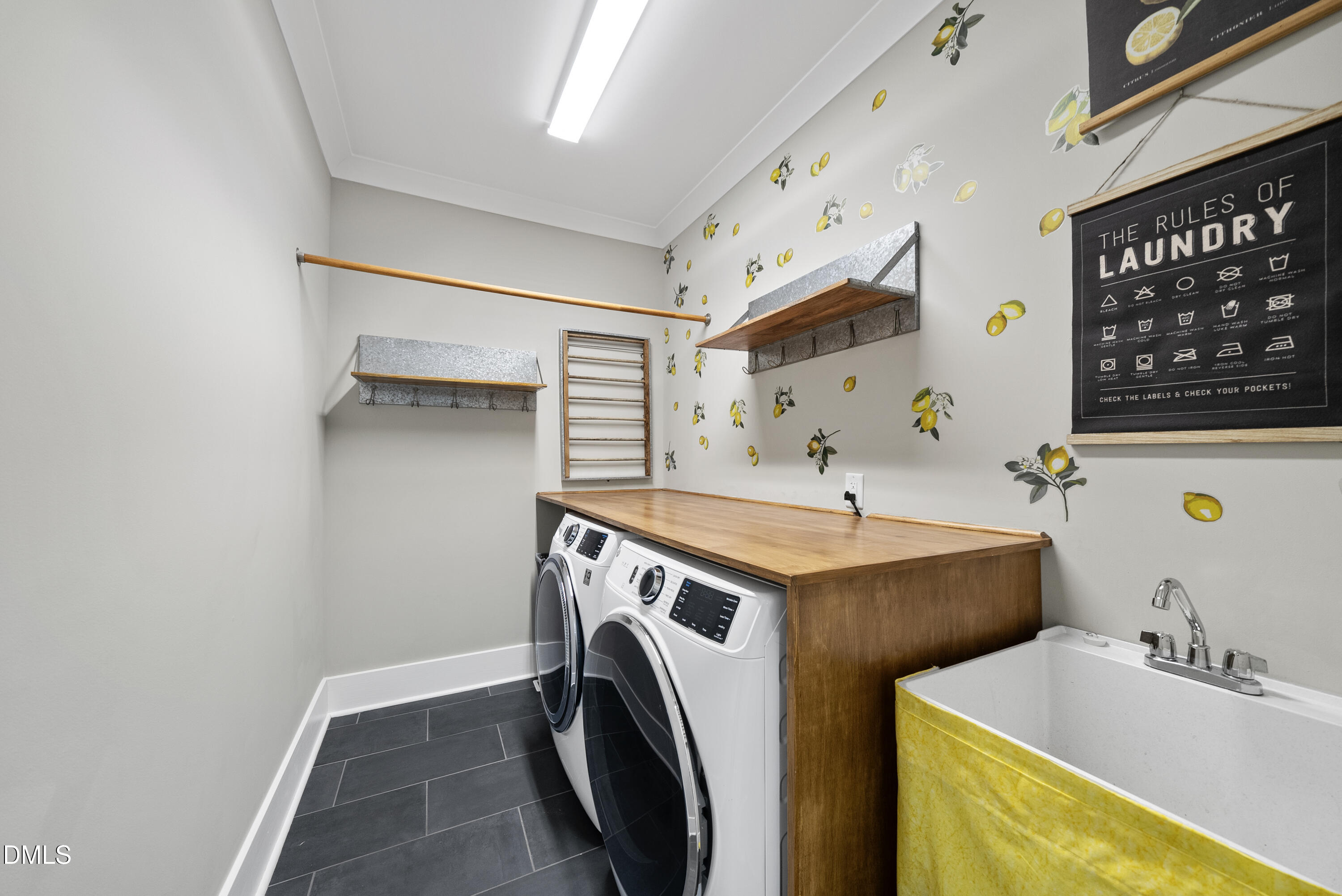 2416 Eddie Howard Road Willow Spring, NC 27592 - Photo 48 of 64 a utility room with dryer and washer