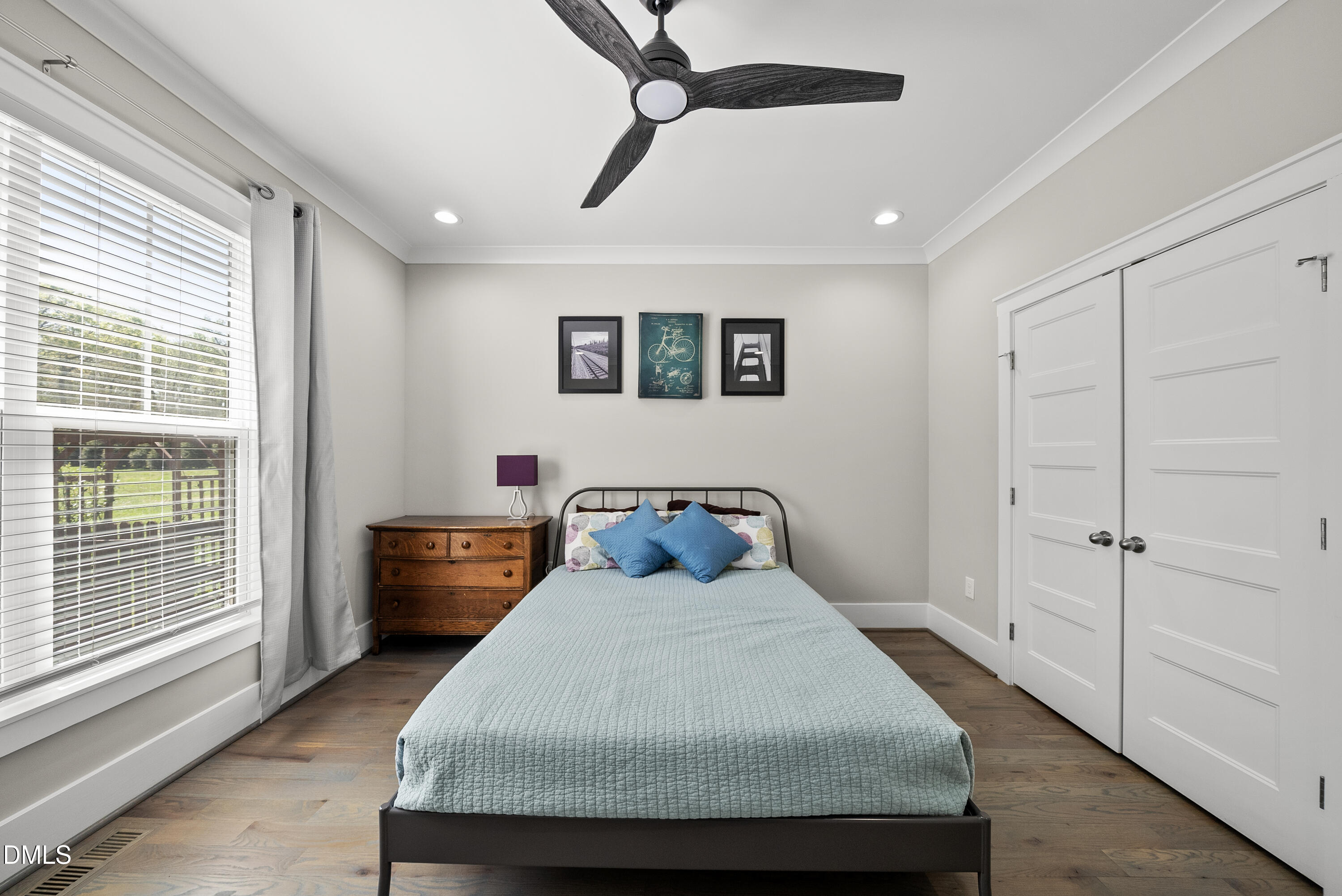 2416 Eddie Howard Road Willow Spring, NC 27592 - Photo 57 of 64 a bedroom with a bed and window