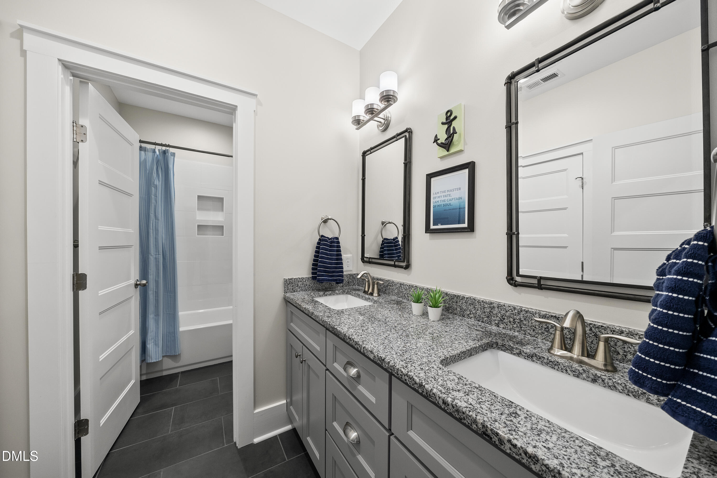 2416 Eddie Howard Road Willow Spring, NC 27592 - Photo 59 of 64 a bathroom with a granite countertop sink and a mirror