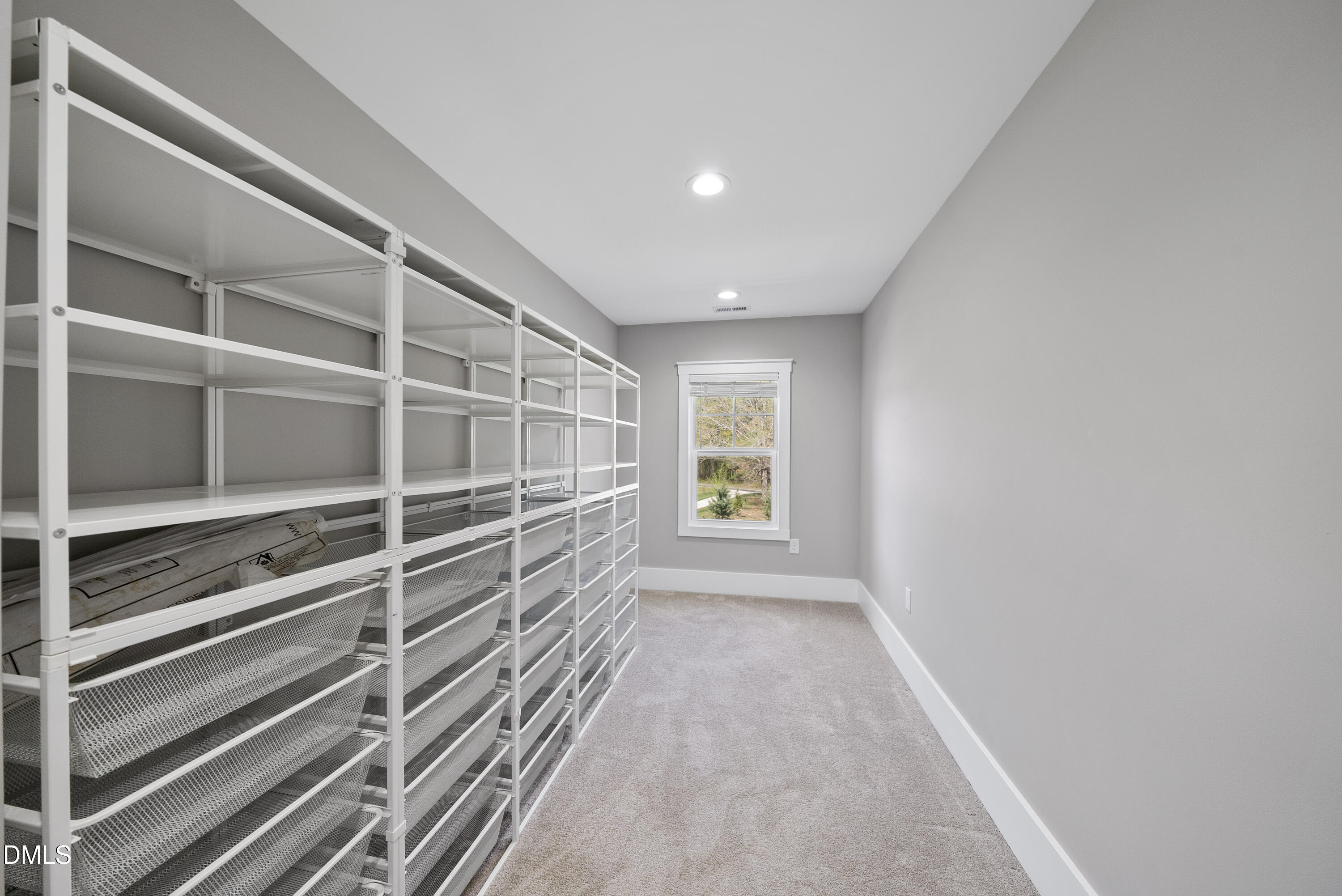 2416 Eddie Howard Road Willow Spring, NC 27592 - Photo 62 of 64 a view of an empty room with a window