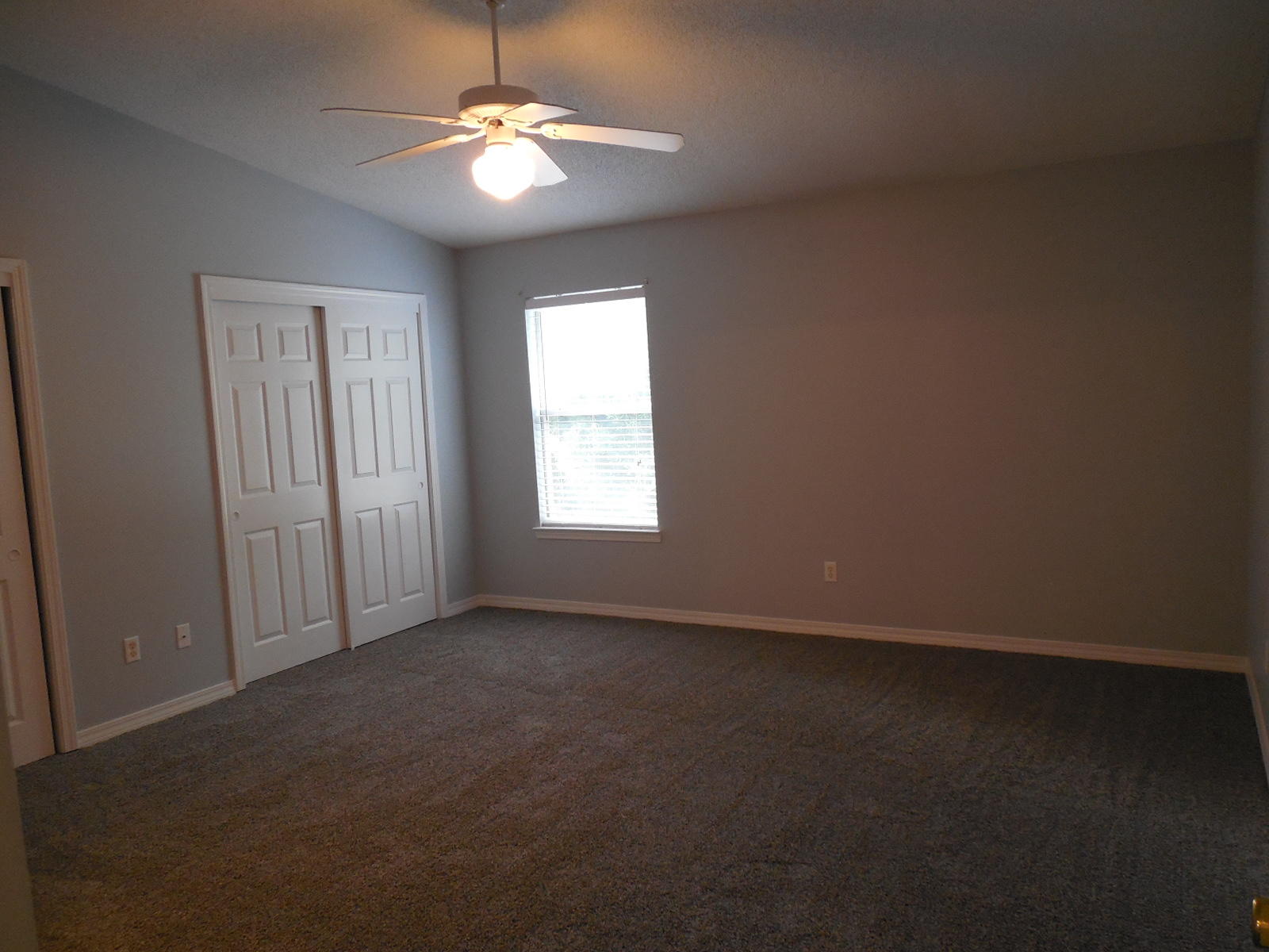502 Keystone Road Mary Esther, FL 32569 - Photo 17 of 22 an empty room with windows and fan