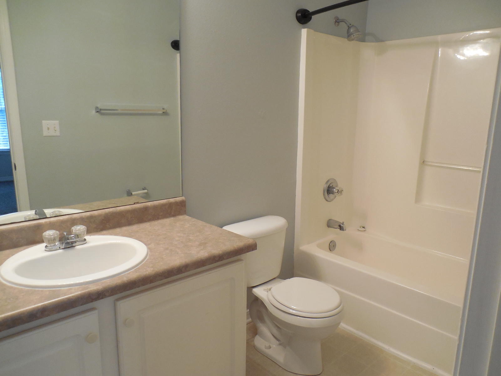 502 Keystone Road Mary Esther, FL 32569 - Photo 19 of 22 a bathroom with a granite countertop sink toilet and shower