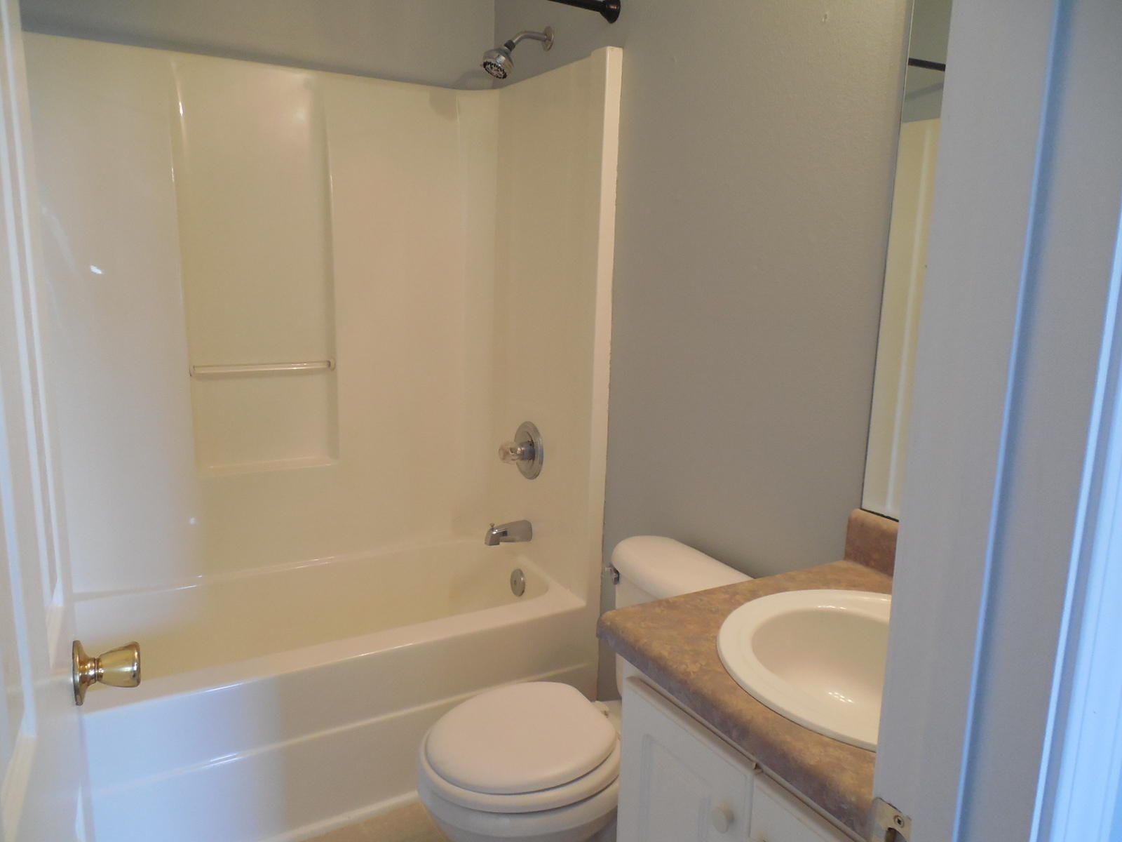 502 Keystone Road Mary Esther, FL 32569 - Photo 21 of 22 a bathroom with a toilet a sink and bathtub