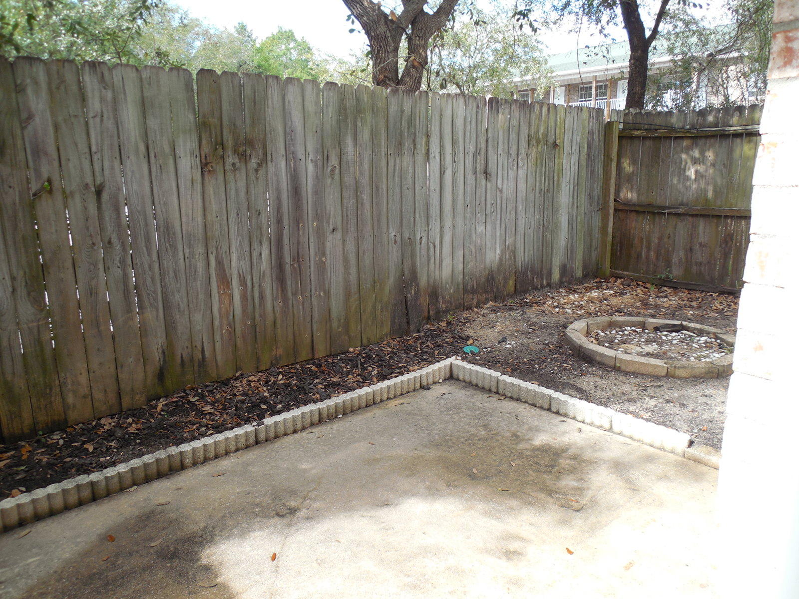502 Keystone Road Mary Esther, FL 32569 - Photo 22 of 22 a view of a backyard with wooden fence