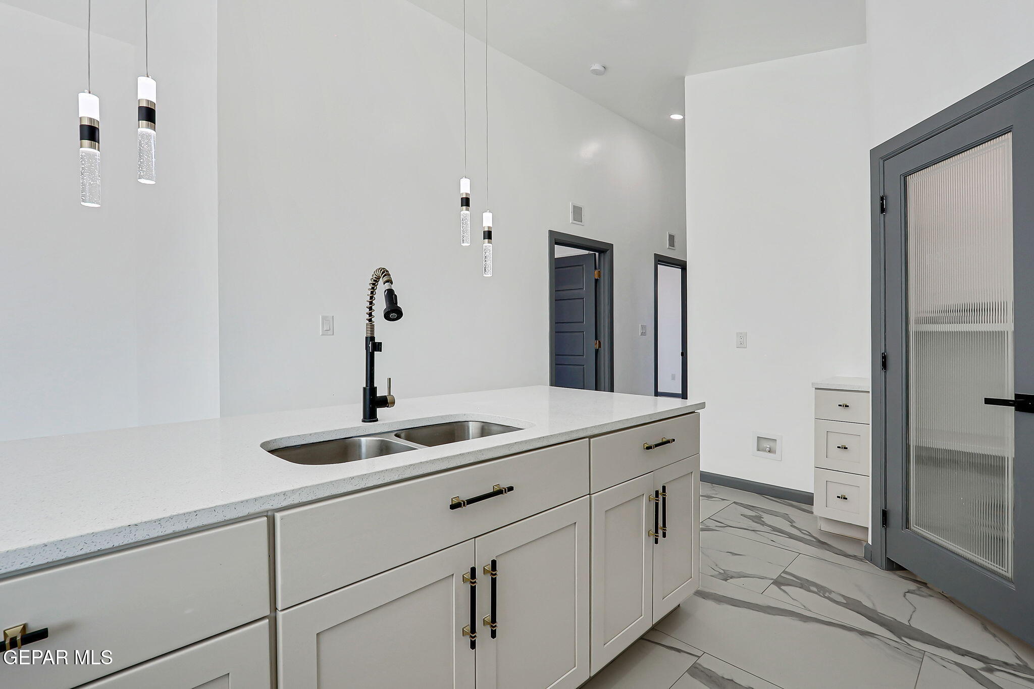 693 San Jose Chaparral, NM 88081 - Photo 15 of 40 a bathroom with a sink and a mirror