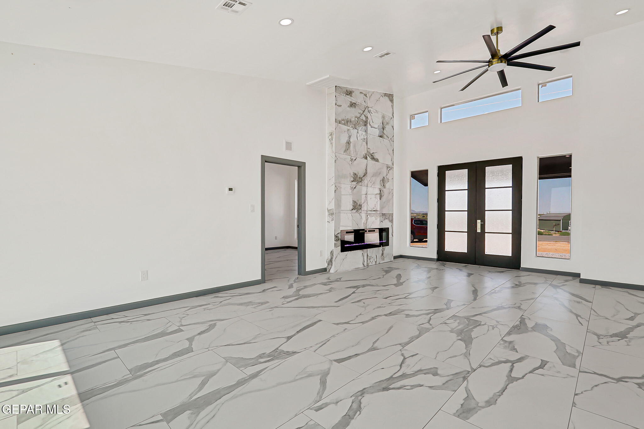 693 San Jose Chaparral, NM 88081 - Photo 17 of 40 a view of empty room with a ceiling fan