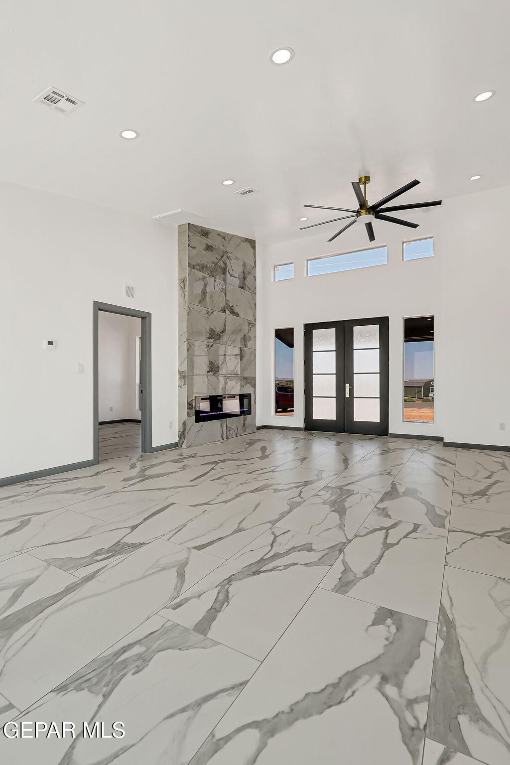 693 San Jose Chaparral, NM 88081 - Photo 19 of 40 a view of a livingroom with a ceiling fan and window