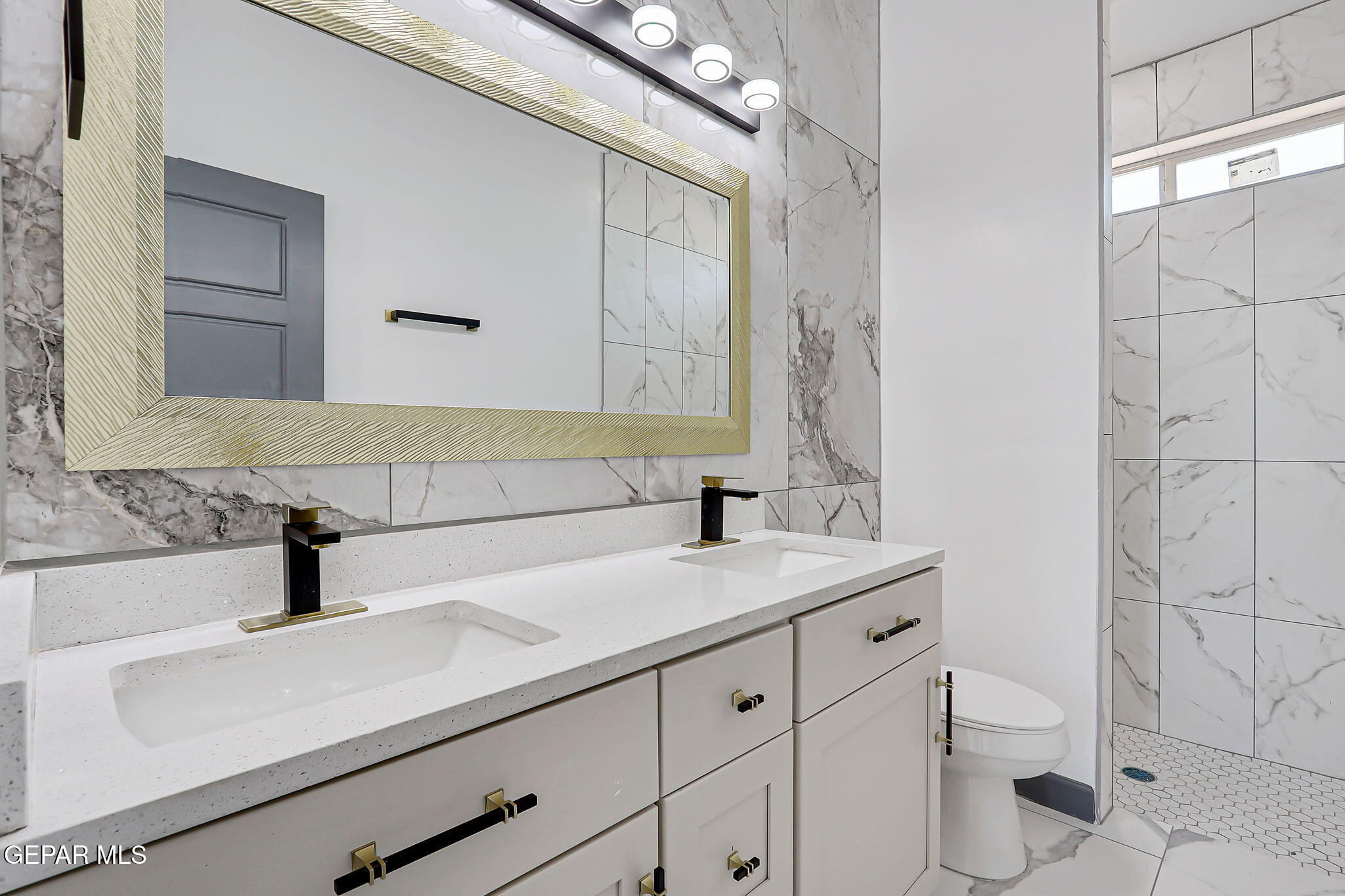 693 San Jose Chaparral, NM 88081 - Photo 25 of 40 a bathroom with a sink and a toilet