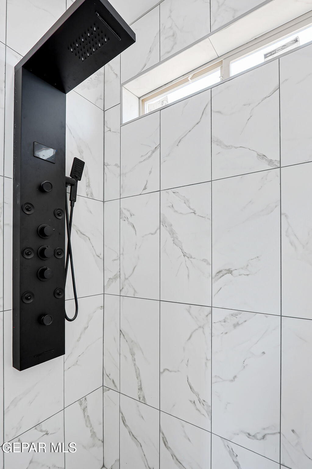 693 San Jose Chaparral, NM 88081 - Photo 26 of 40 a bathroom with a shower