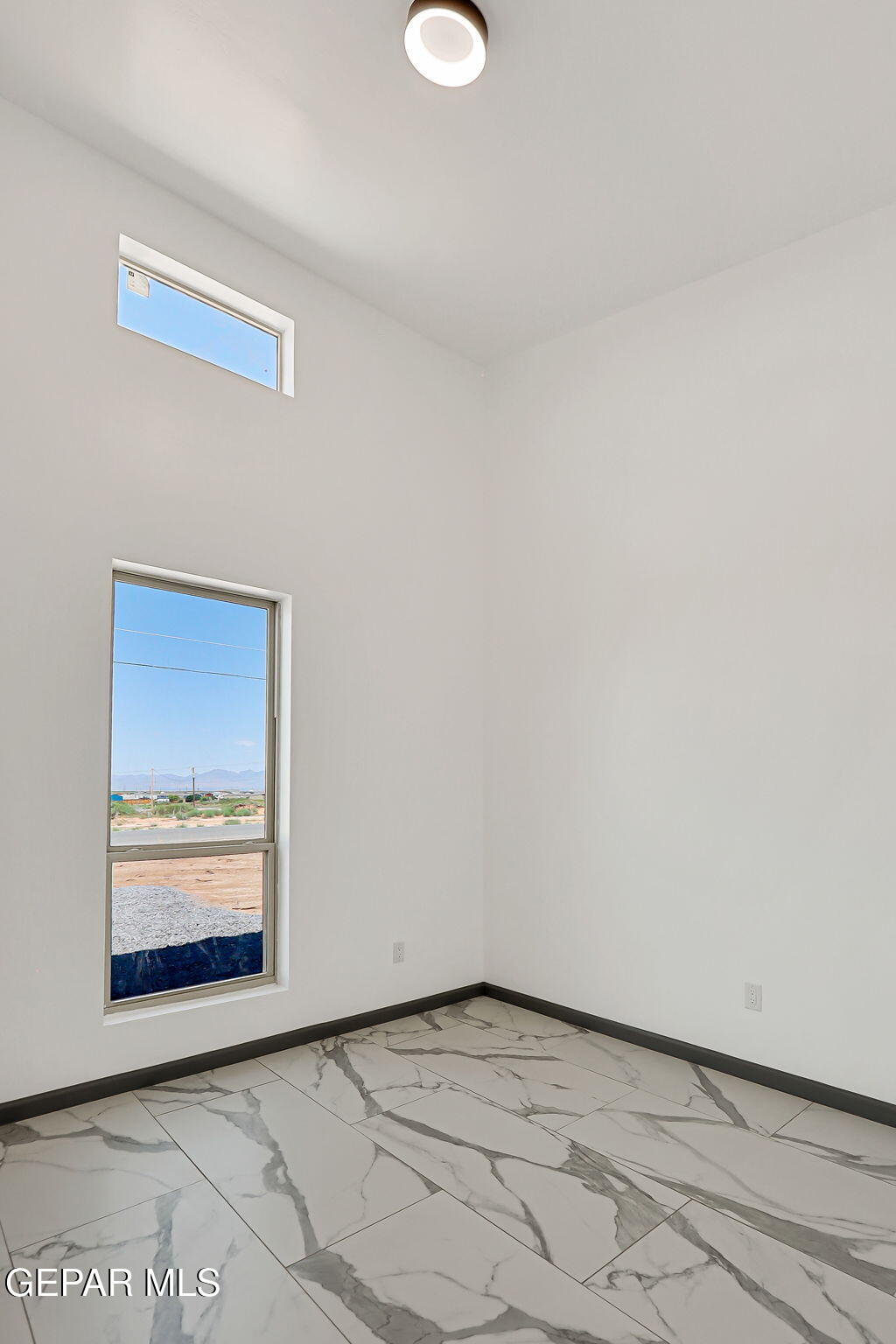 693 San Jose Chaparral, NM 88081 - Photo 35 of 40 a view of an empty room and wooden floor