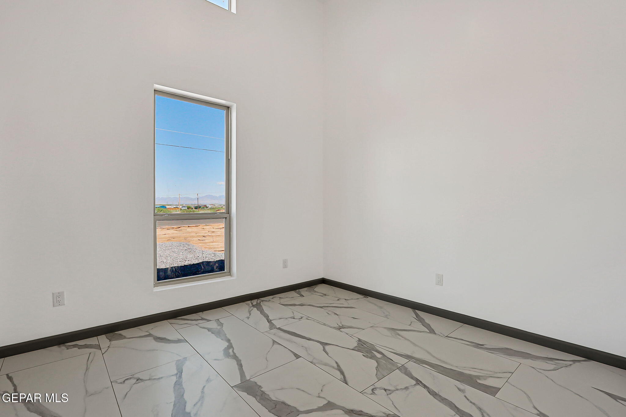 693 San Jose Chaparral, NM 88081 - Photo 36 of 40 an empty room with a window