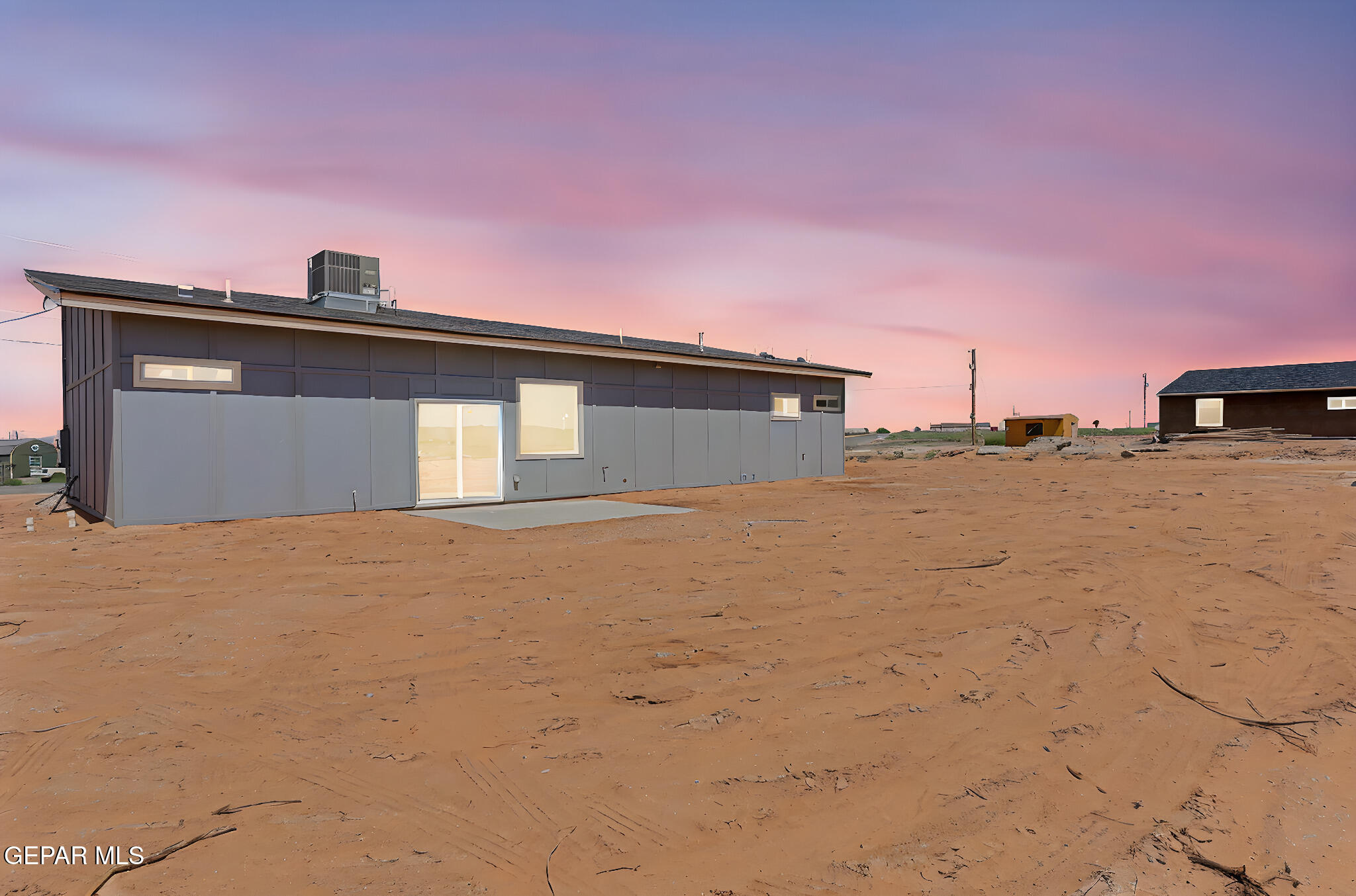 693 San Jose Chaparral, NM 88081 - Photo 39 of 40 a view of outdoor space and front view of a building