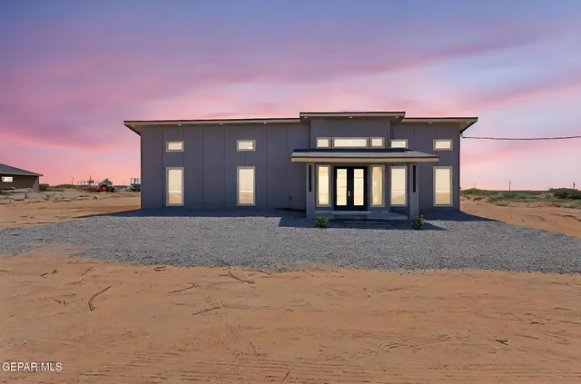 a front view of a house having yard