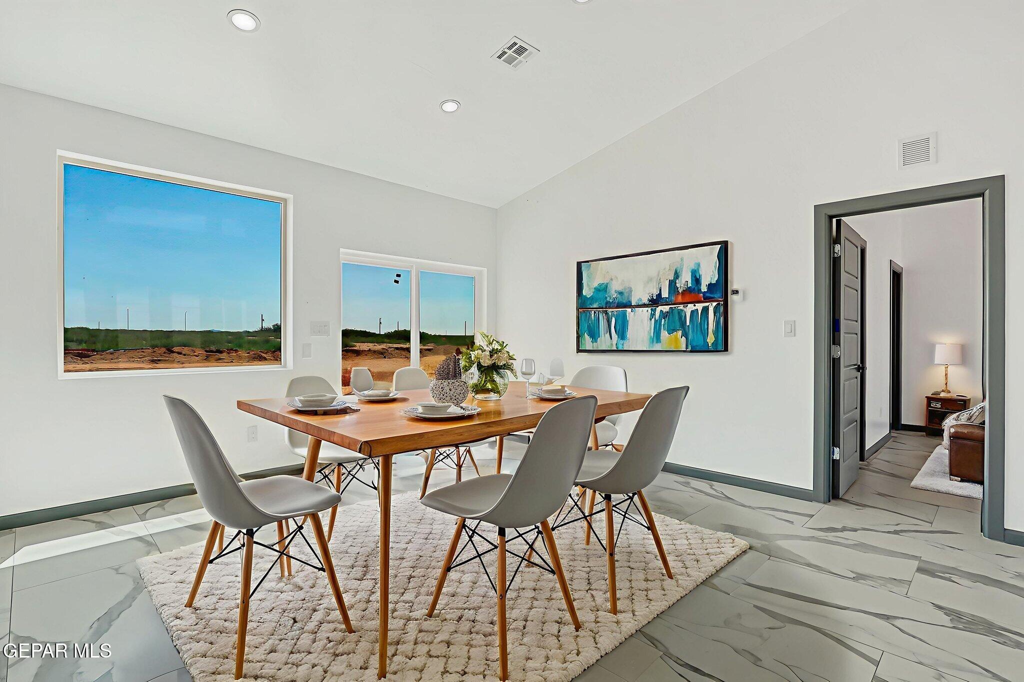 693 San Jose Chaparral, NM 88081 - Photo 10 of 40 a view of a dining room with furniture
