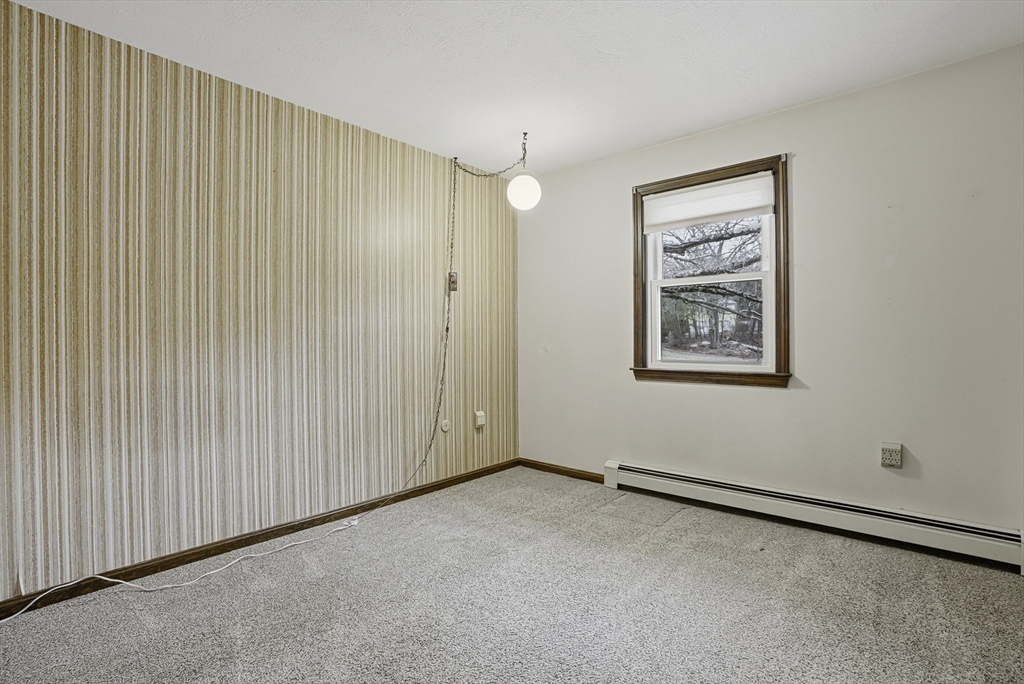 4 Carby Drive Mendon, MA 01756 - Photo 20 of 35 an empty room with a empty space and window