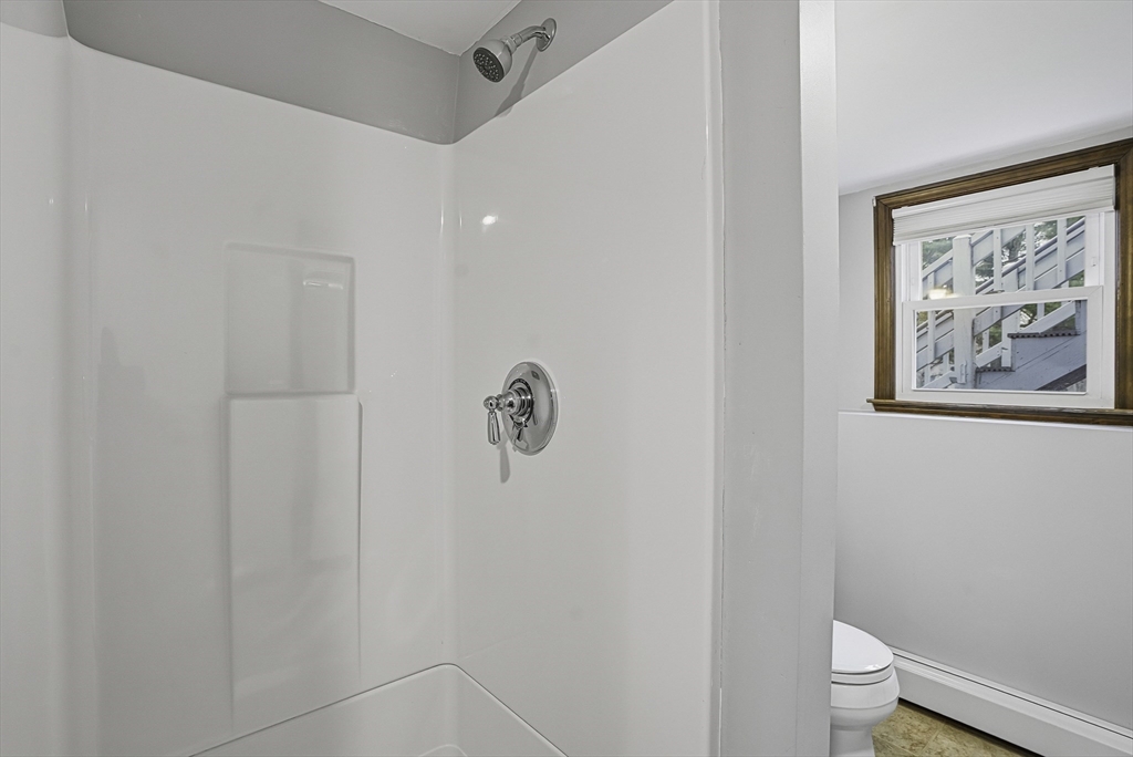 4 Carby Drive Mendon, MA 01756 - Photo 29 of 35 a bathroom with a shower and a toilet