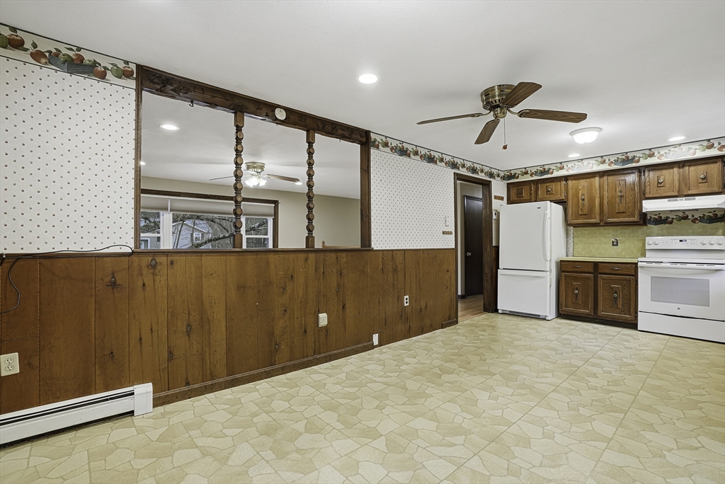 4 Carby Drive Mendon, MA 01756 - Photo 10 of 35 a view of a kitchen with refrigerator and cabinets