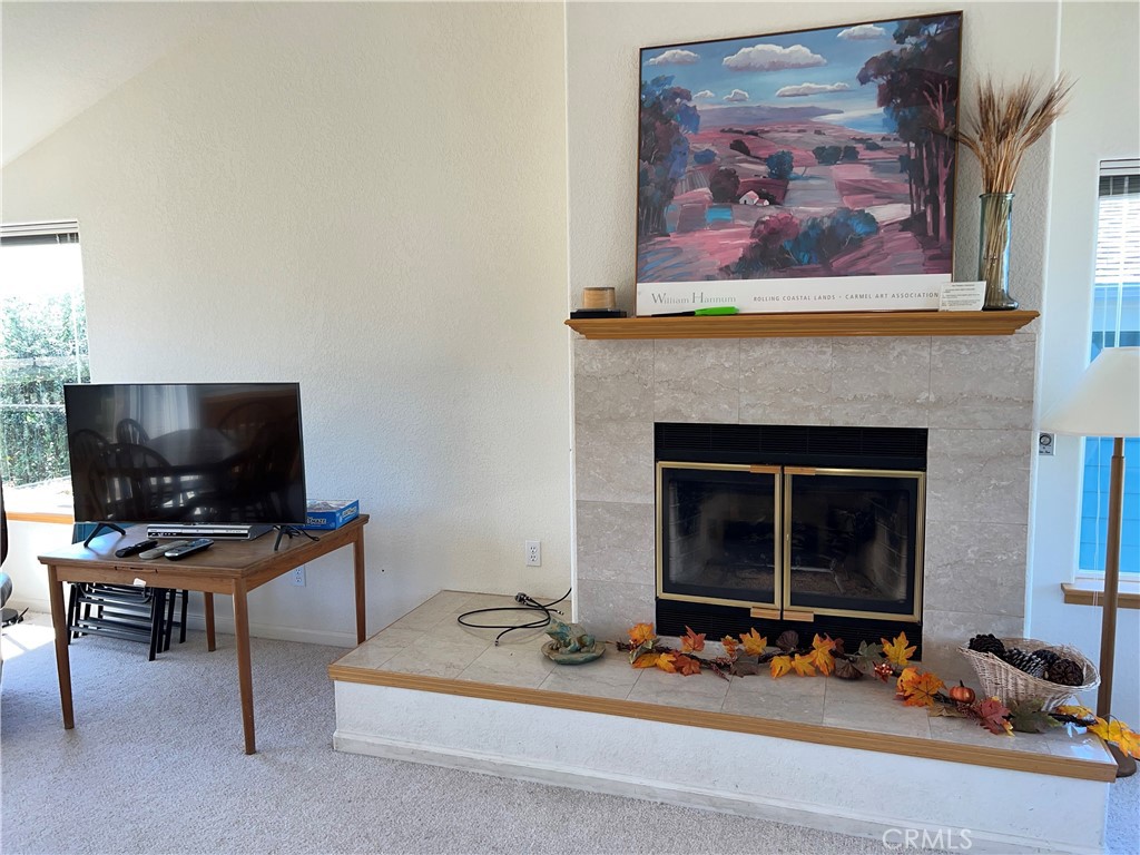 330 Jean Street Cambria, CA 93428 - Photo 16 of 75 a living room with furniture and a fireplace