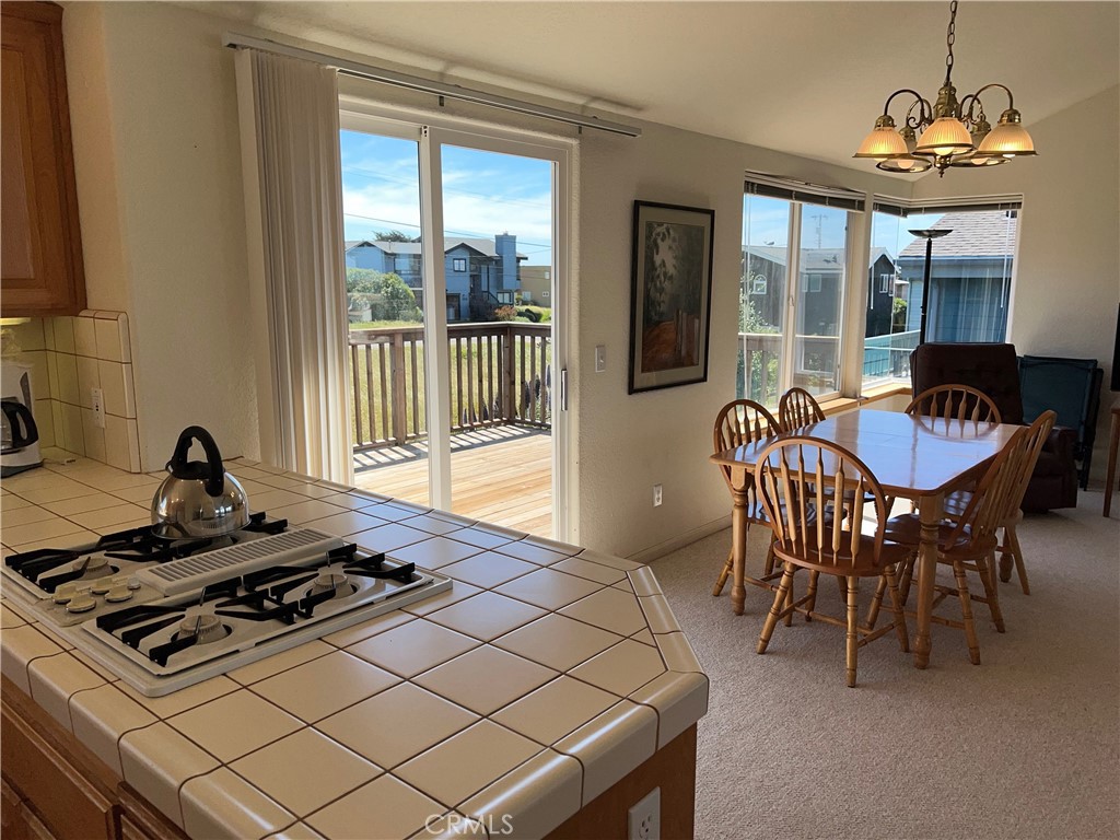330 Jean Street Cambria, CA 93428 - Photo 21 of 75 a dining room with furniture and window