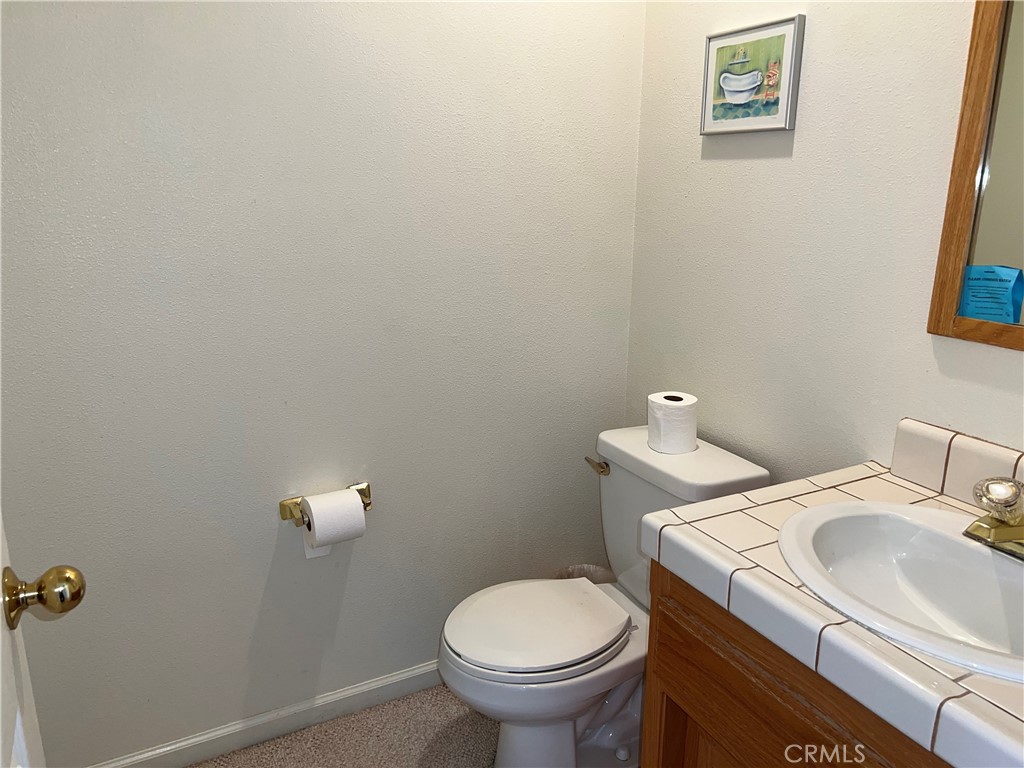 330 Jean Street Cambria, CA 93428 - Photo 38 of 75 a bathroom with a sink and a toilet